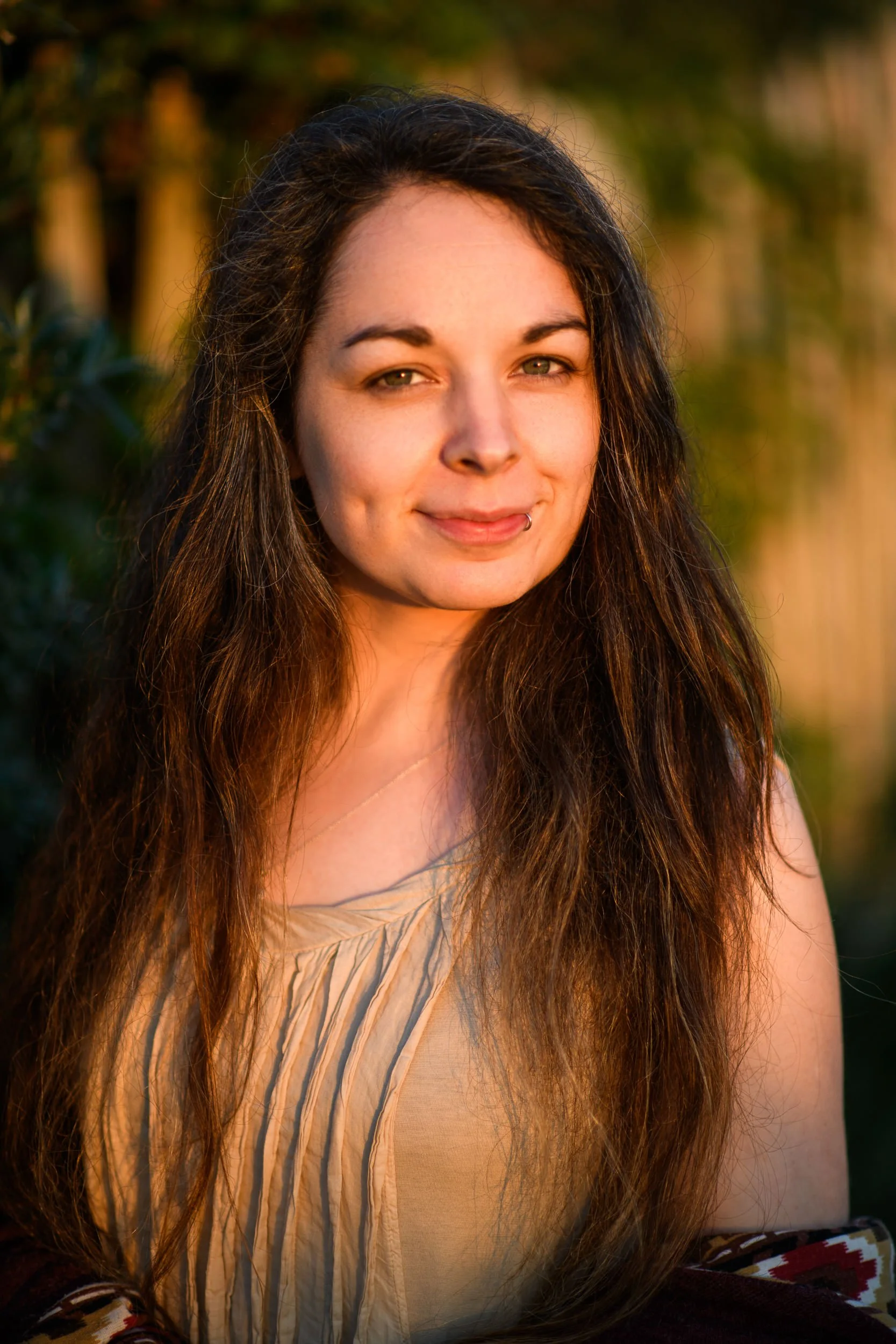 Portrait Photography France – candid sunset portrait with natural expression in Normandy