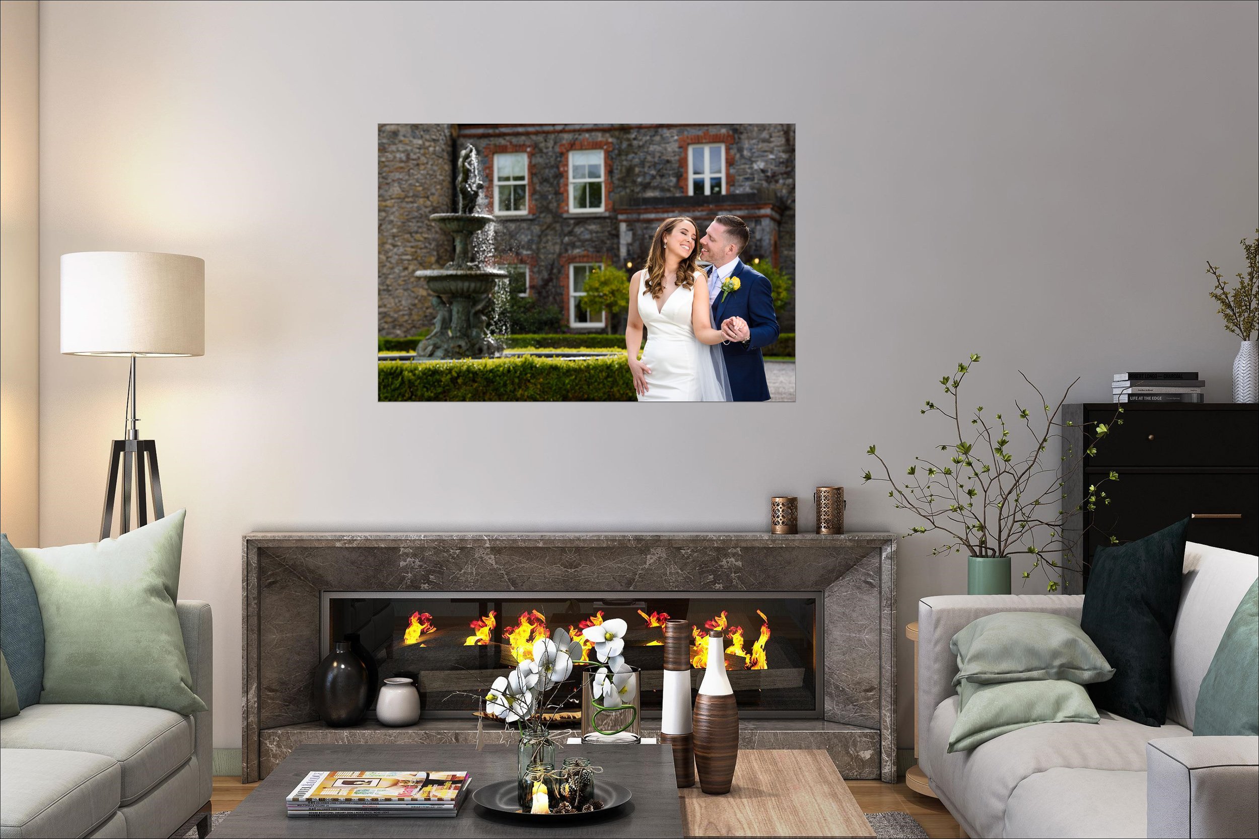 Contemporary living space with fireplace and large framed wedding photograph as a feature piece.
