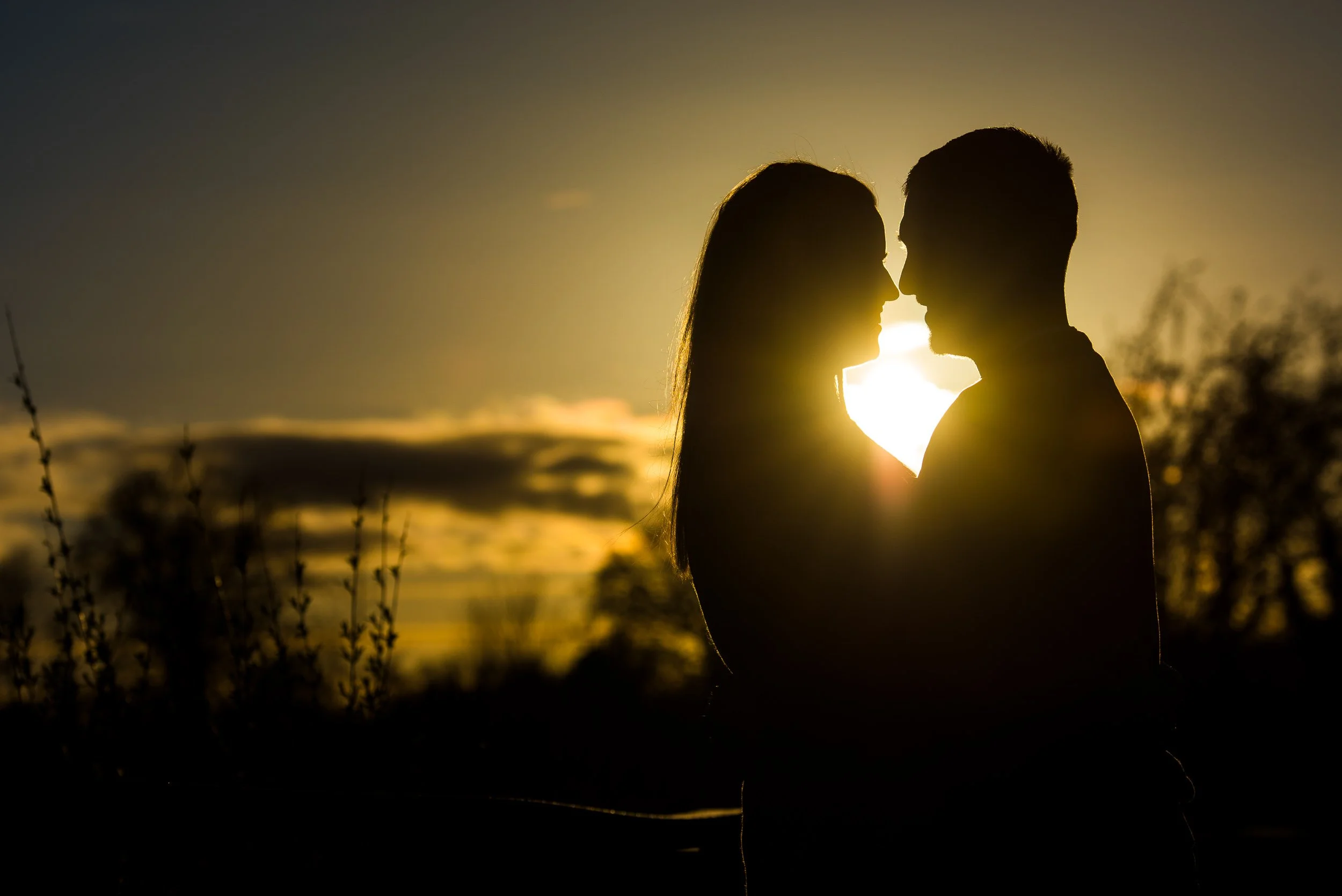 Engagement Photography Westmeath – silhouette couple at sunset at Dún na Sí Moate