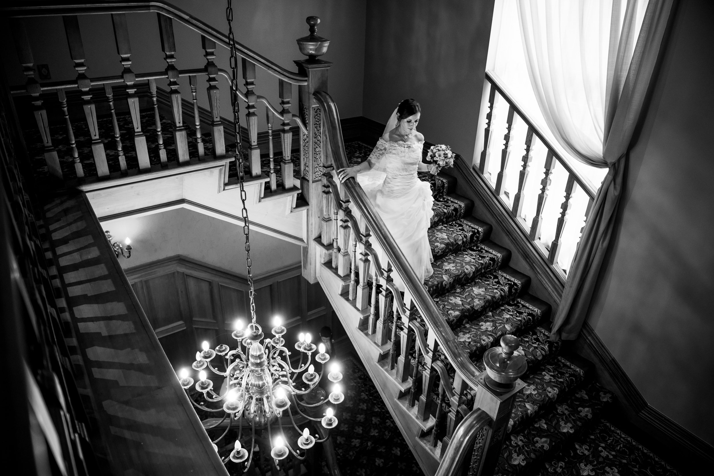 Wedding Photography Gort – bride descending staircase at Lady Gregory Hotel