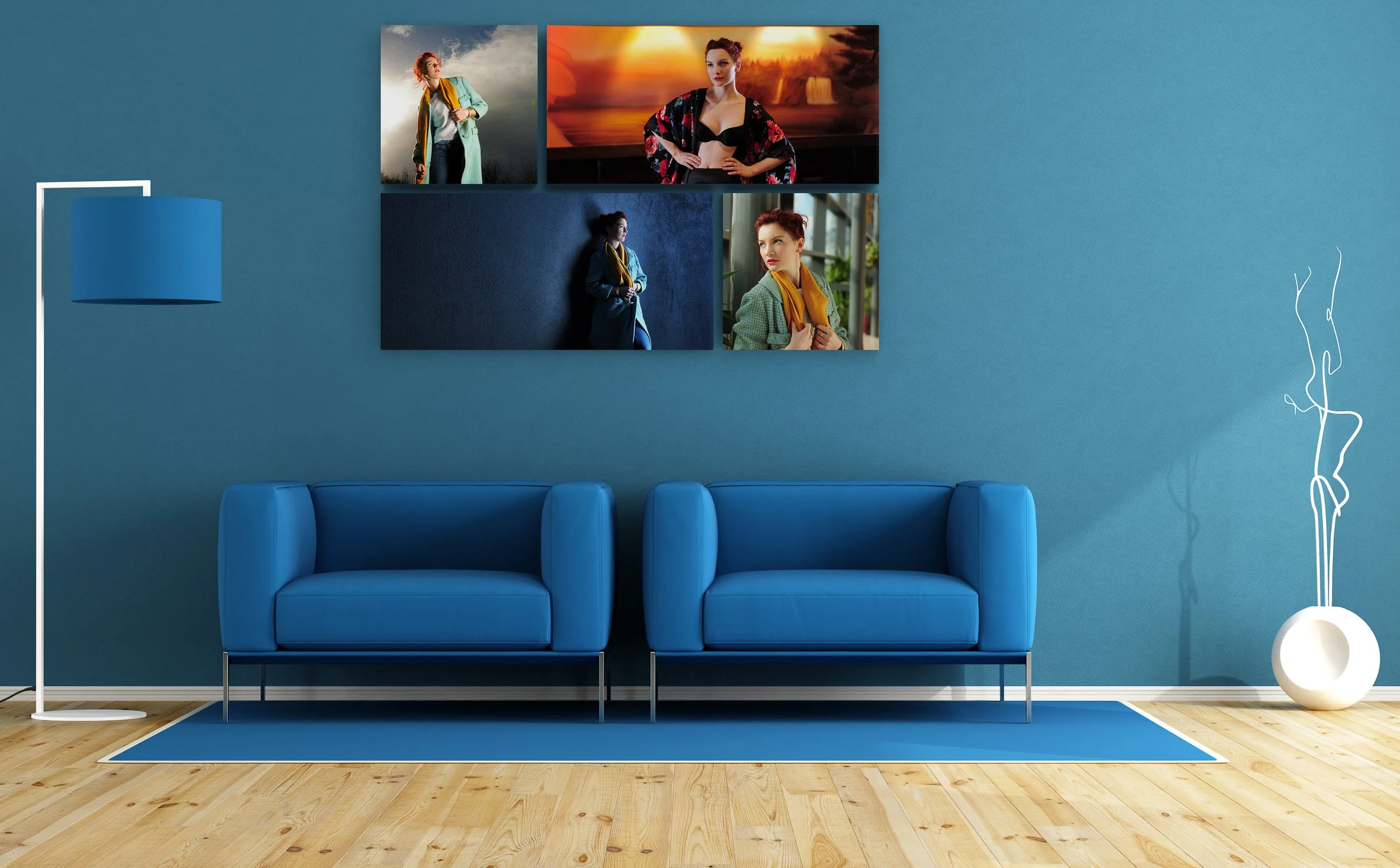 Modern living room with blue tones and a gallery wall of framed portrait photography.
