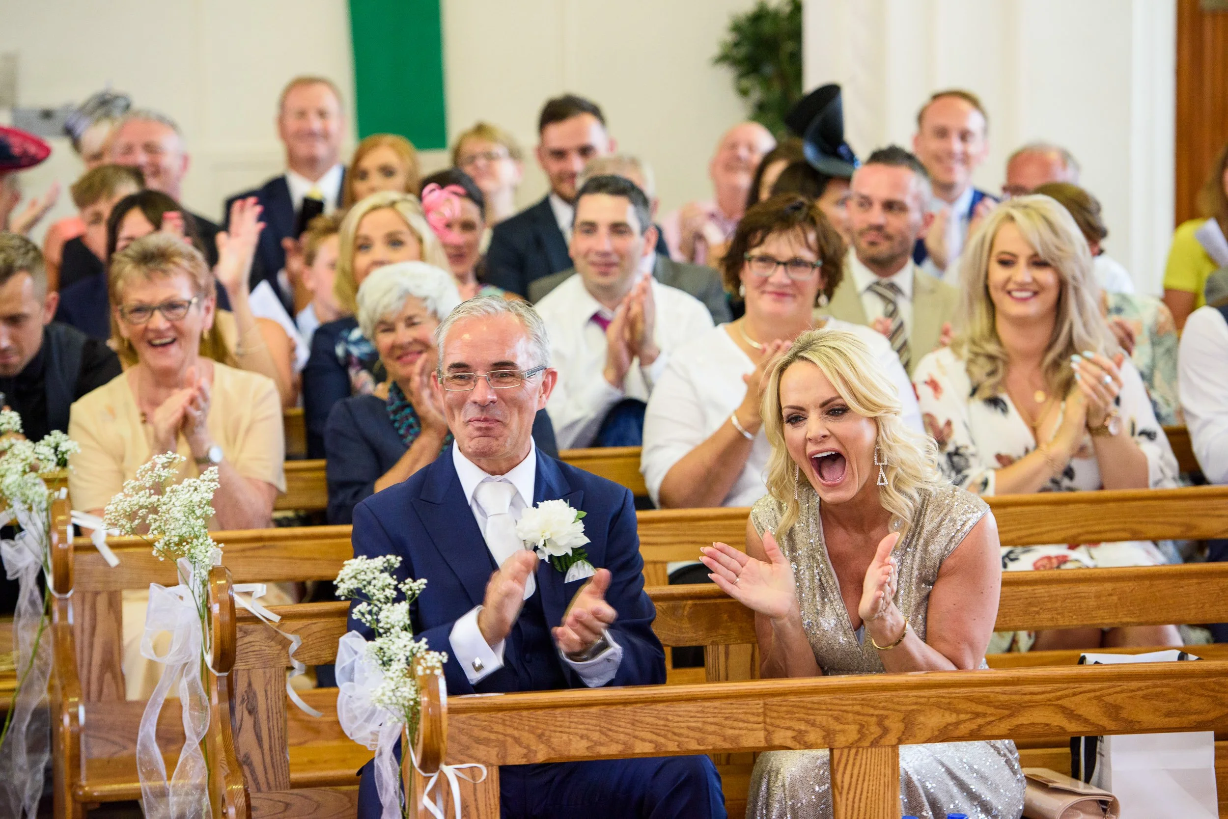 Natural candid wedding moment during ceremony in Ireland – documentary wedding photography