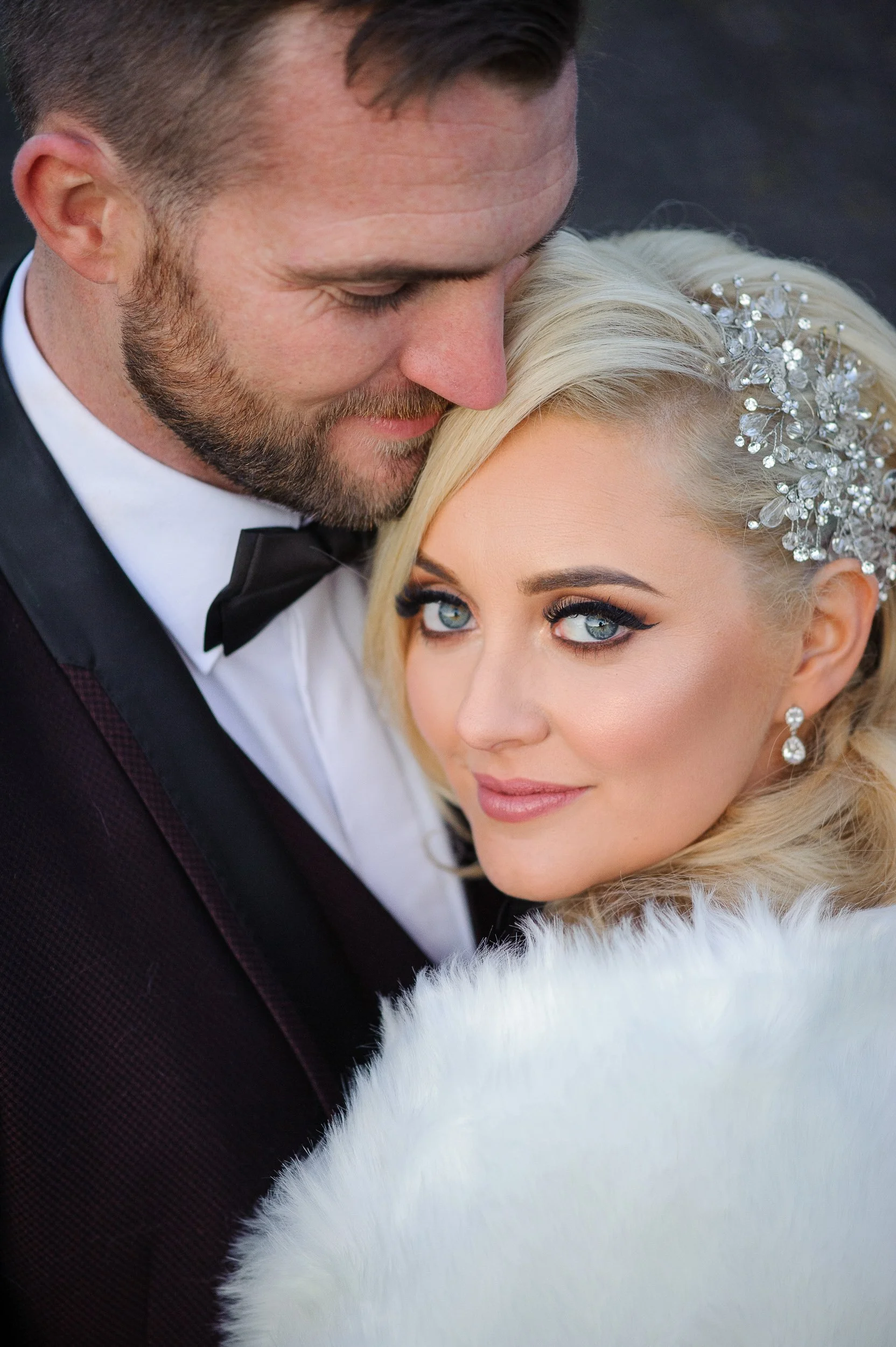 romantic embrace for a bride and groom at Westport house 