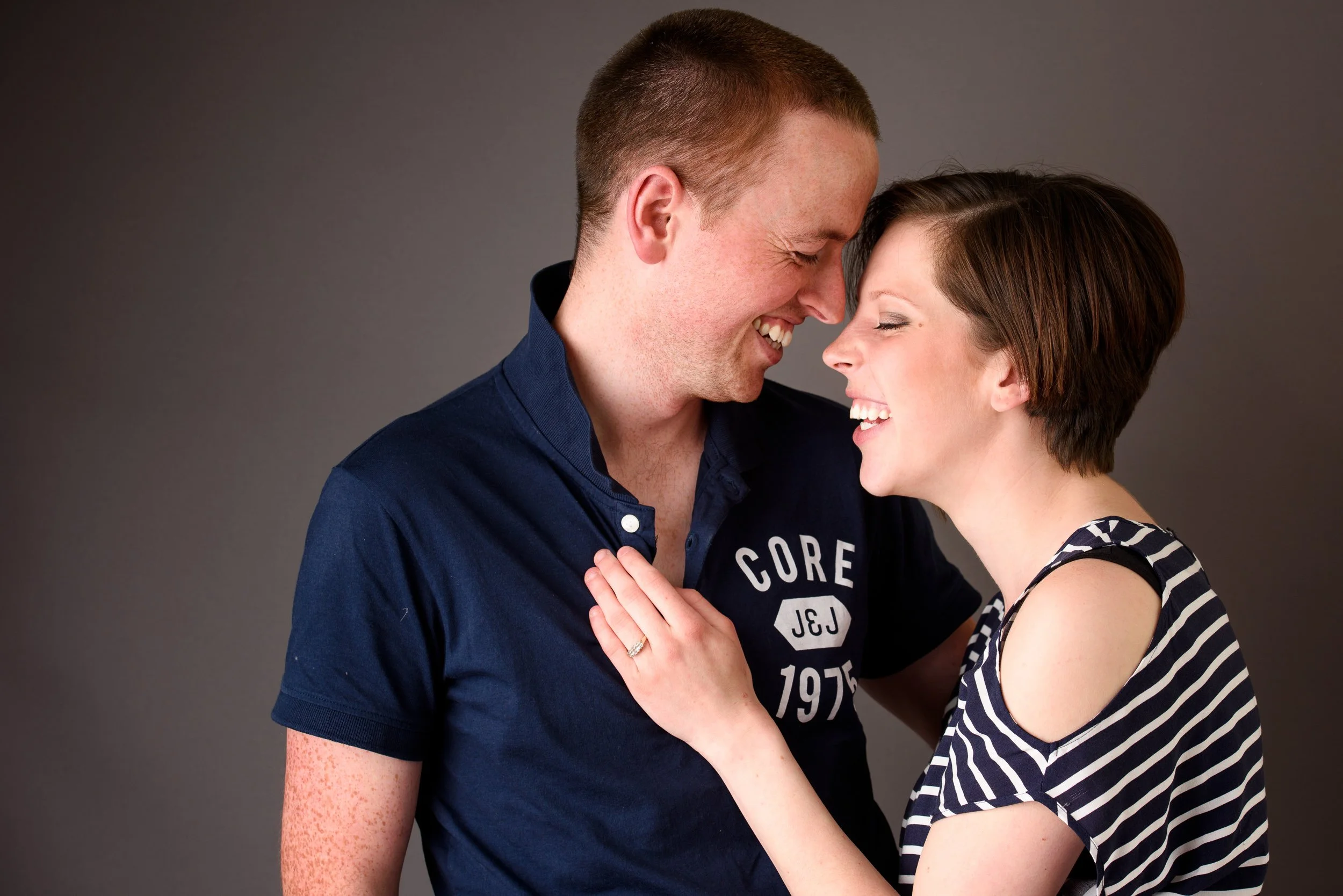Engagement Photography Ireland – studio couple portrait with soft background