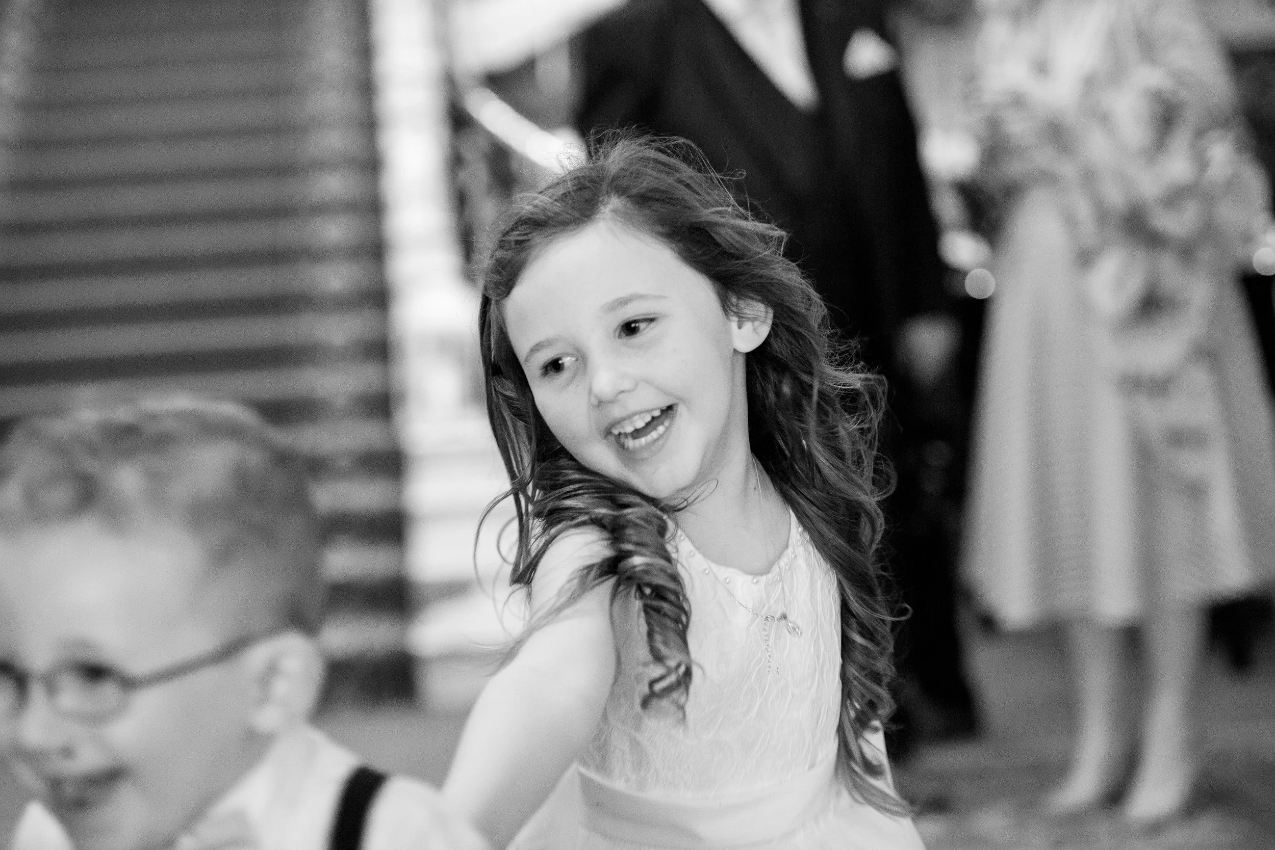 Wedding Photography Tullamore – flower girl dancing at Bridge House Hotel