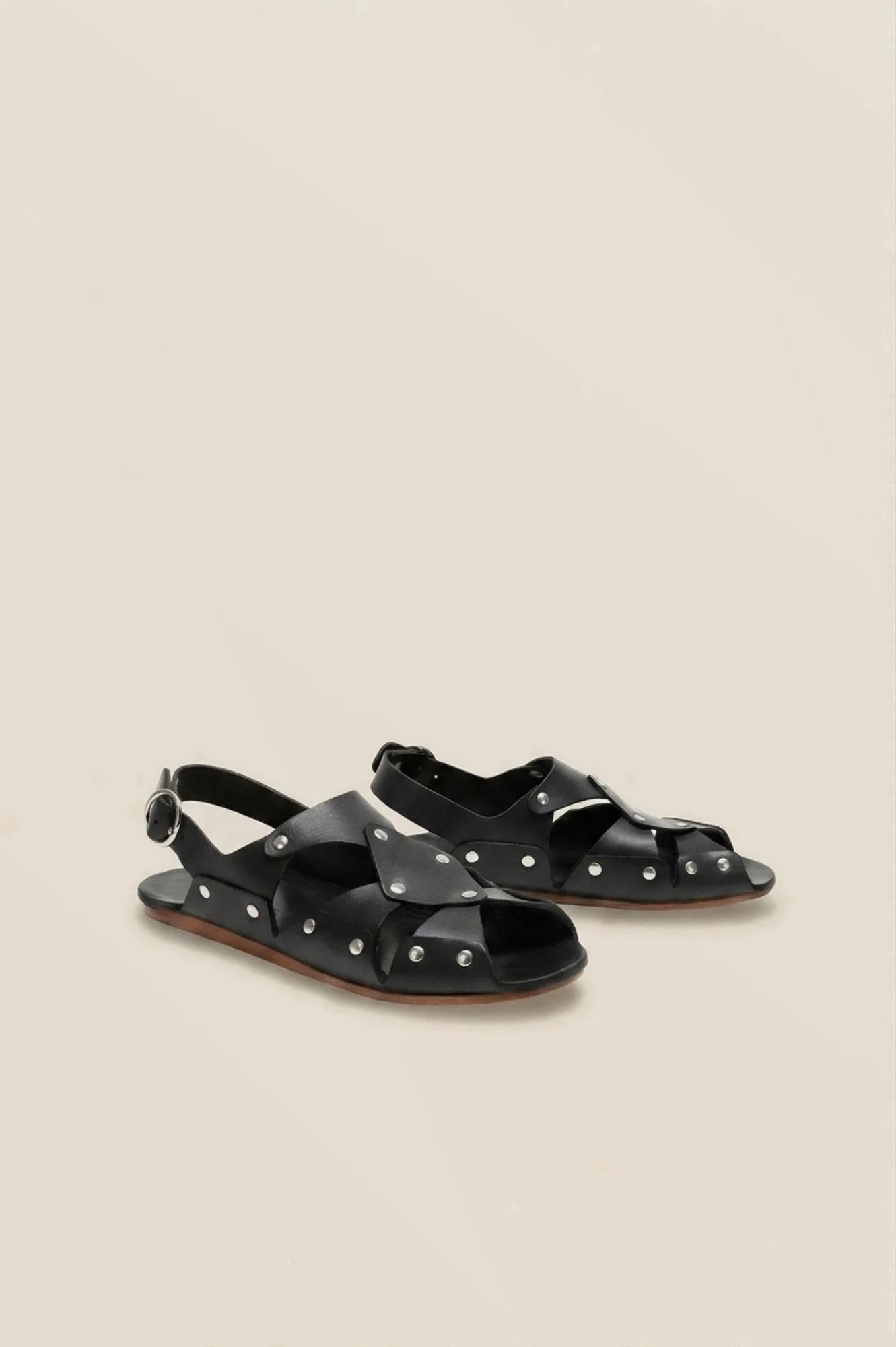 Cordoa Muscari B sandal in black, three quarters view of the studded leather crossover straps