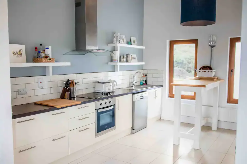 Kitchen & Dining - A fully equipped kitchen and dining area for eight guests, perfect for effortless entertaining.