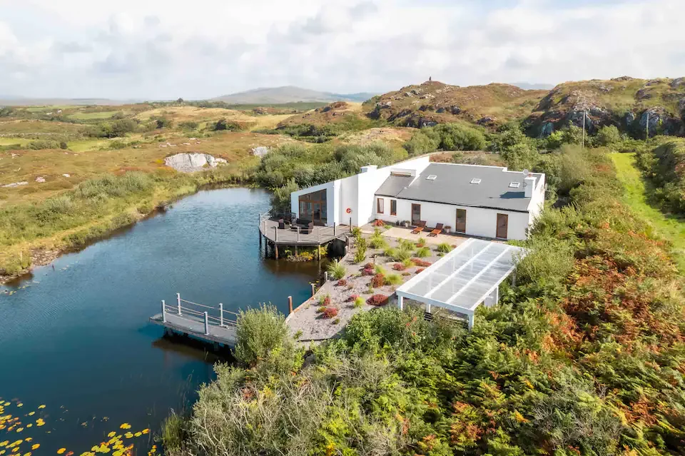 Outdoor living is at the heart of The Lake House. 
A spacious deck overlooks the water, leading down to a private pier where you can sit, swim, or simply take in the view. 