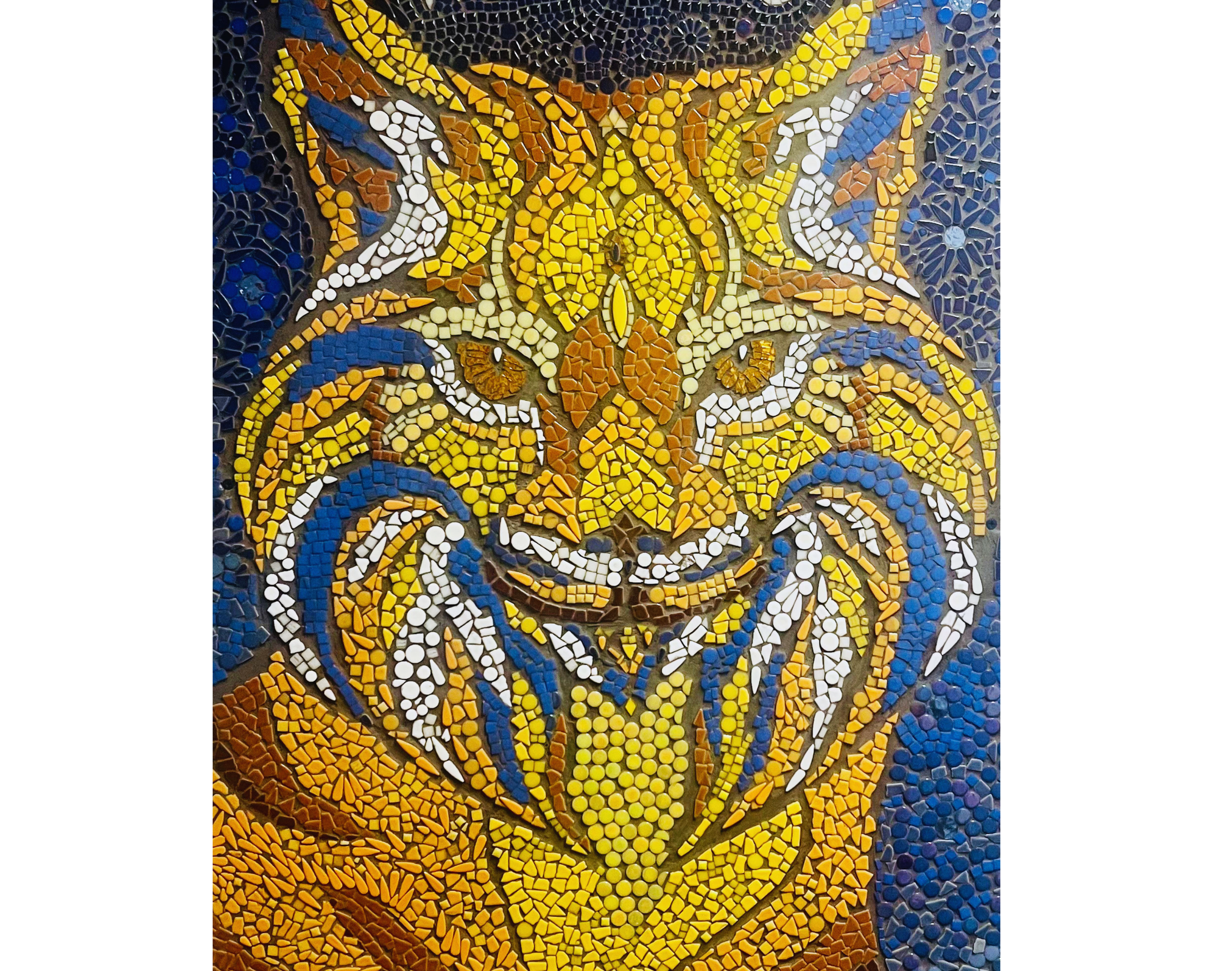 closeup of mosaic mural depicting a fierce wildcat in gold and blue 