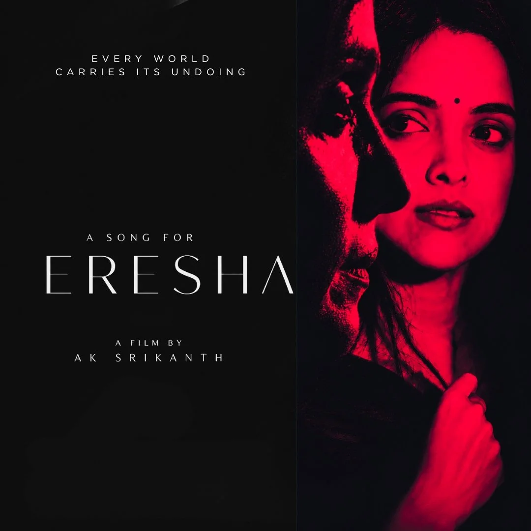 Black and red film poster for "Eresha", featuring a woman's face on the right and a man hilding her on the left, with text "Every world carries its undoing", "A song for Eresha", and "A film by AK Srikanth".