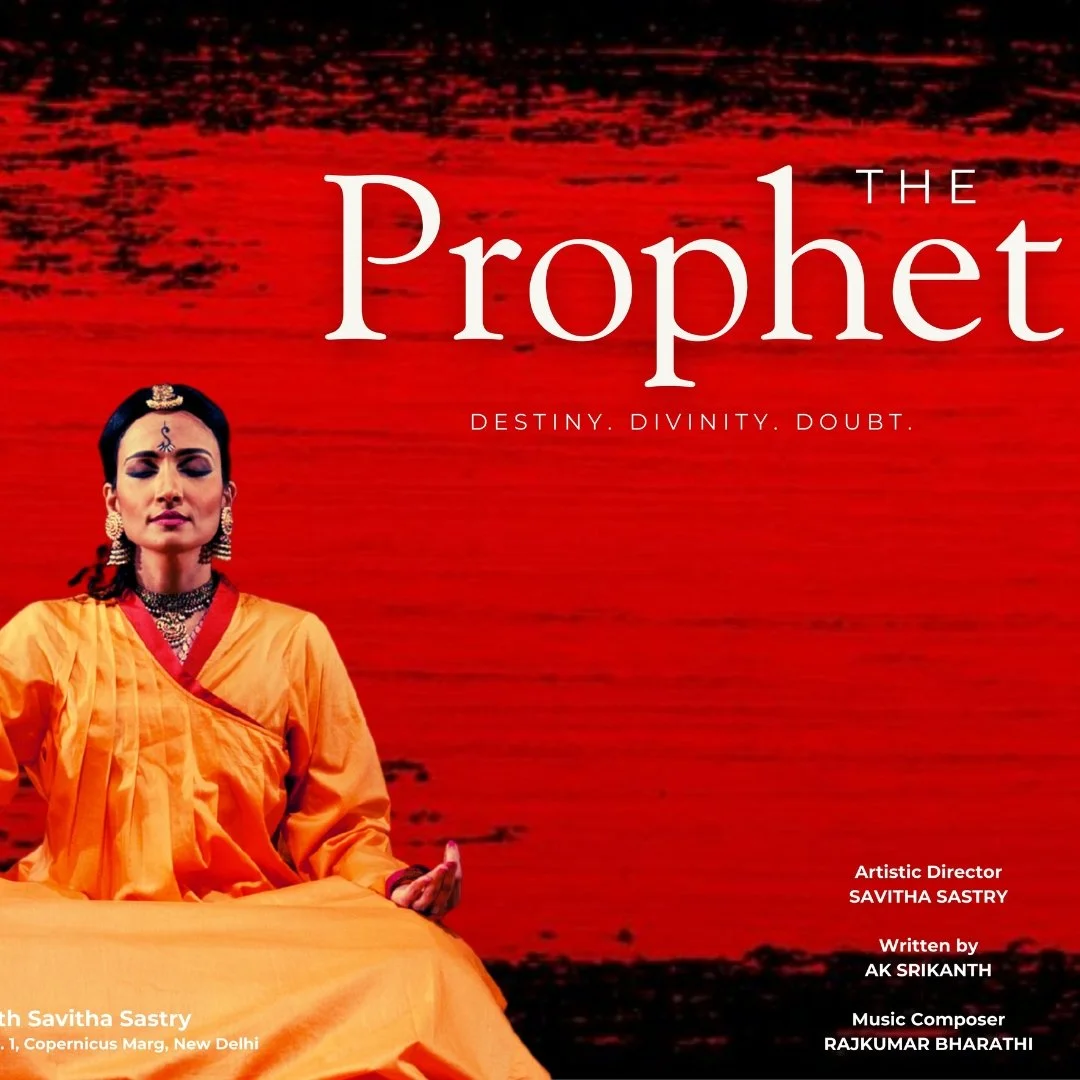 Promotional poster for a show called 'The Prophet' featuring a woman in traditional attire meditating with a red and black background.
