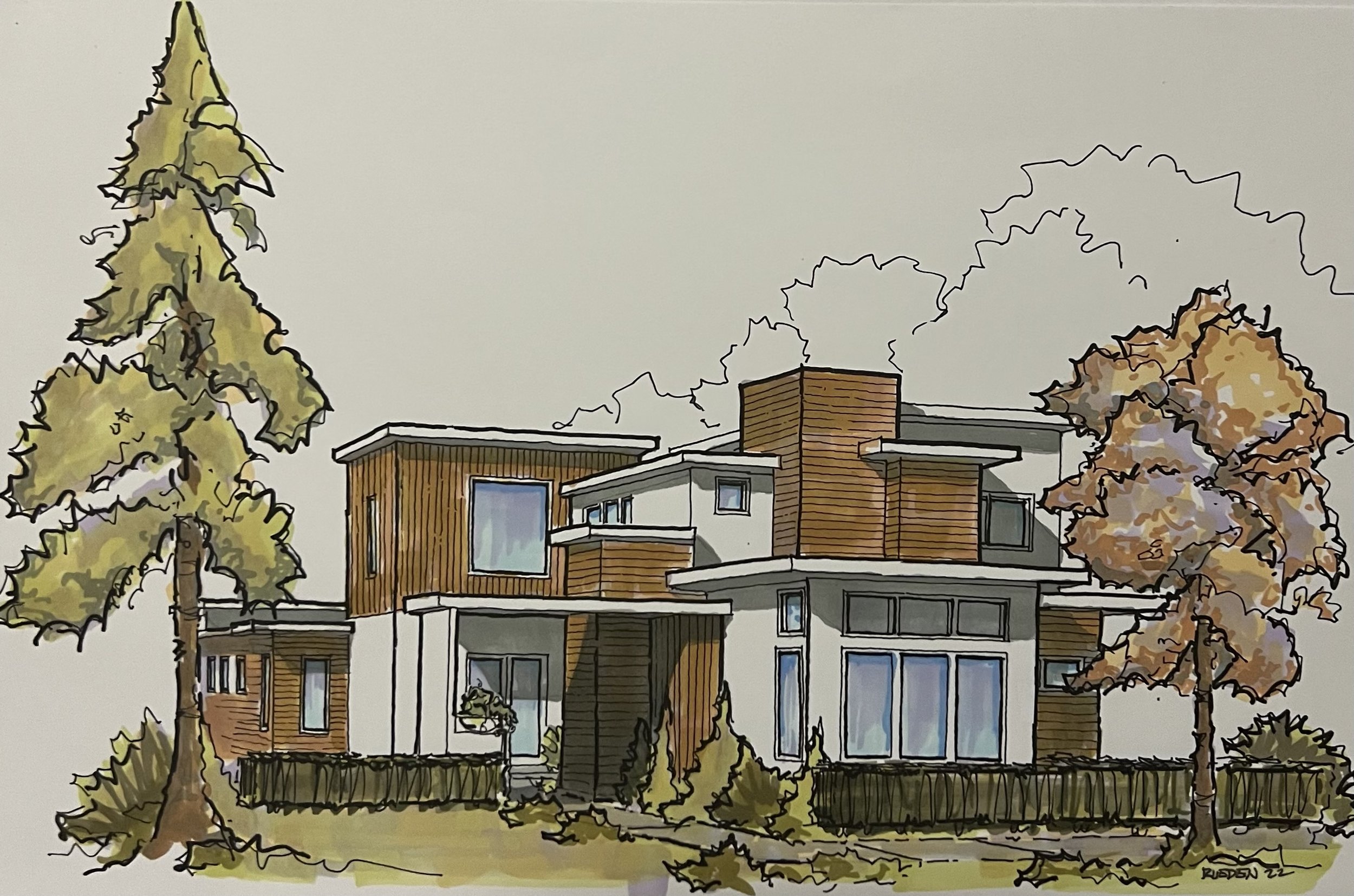 A modern multi-story house surrounded by trees with yellow and brown leaves. The house features large windows and wooden paneling, with smoke rising from a chimney against a light sky.