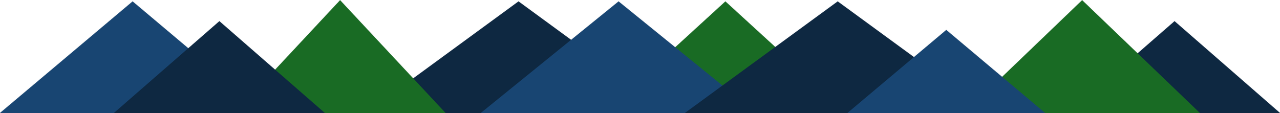 A geometric pattern of overlapping triangles in blue, green, and black colors.