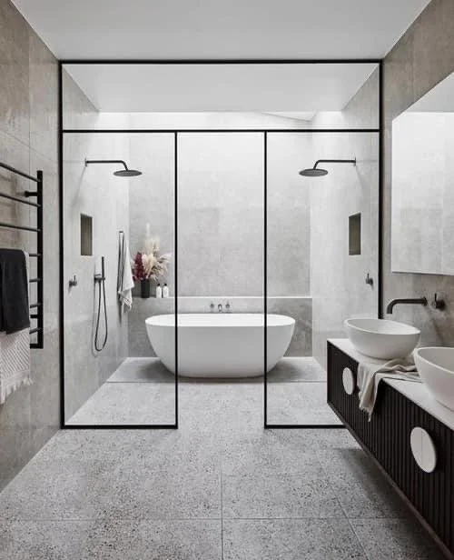 Inspiration rendering: wet room with freestanding tub between two shower heads