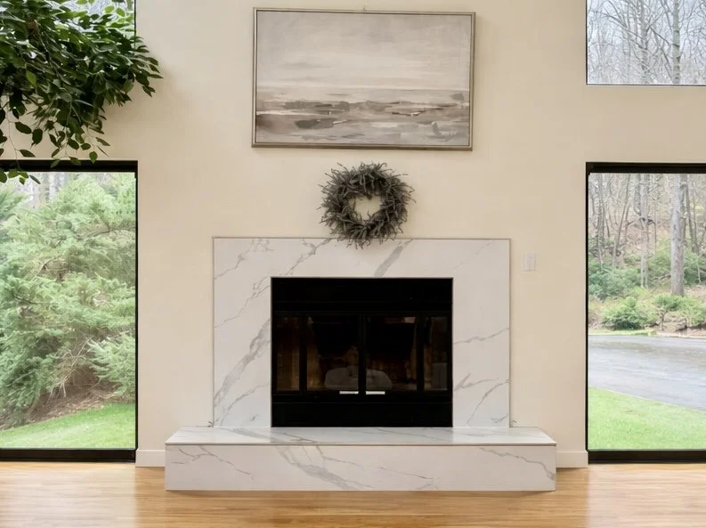 Finished fireplace resurface with porcelain slab in a stone look, full-height floor to ceiling