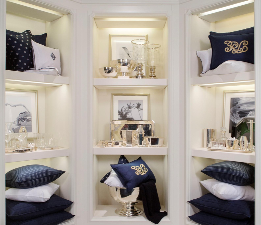 Alexander Mann product presentation, Ralph Lauren home collection, pillow and textile display, luxury retail shelving