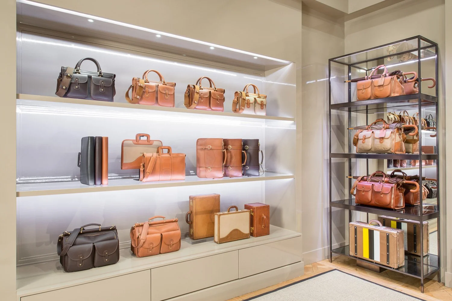 Alexander Mann retail environment design, Ghurka Madison Avenue flagship, leather briefcase and bag collection, retail shelving, Ghurka briefcases