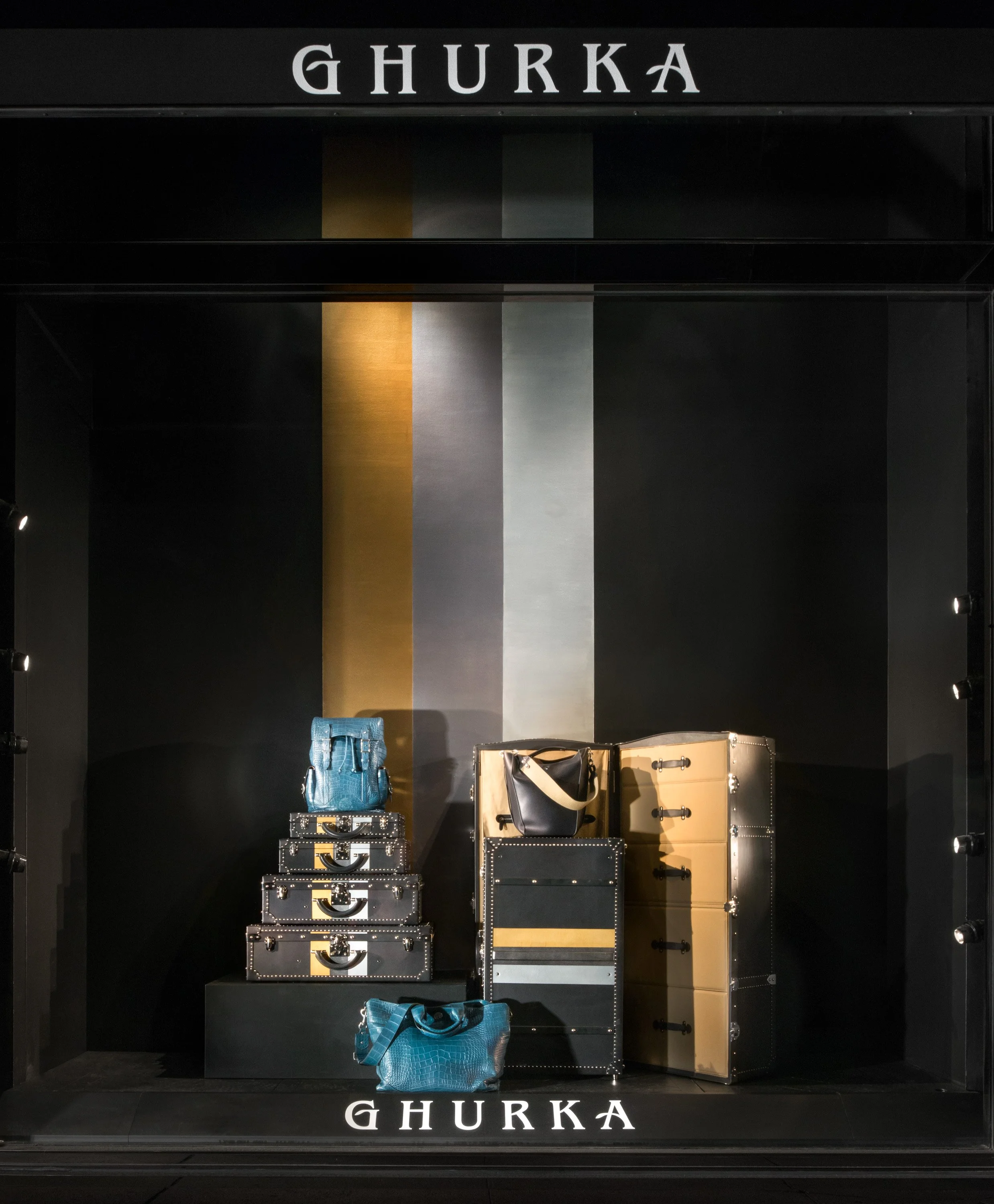 Alexander Mann retail environment design, Ghurka Madison Avenue window display, luxury leather goods, New York City