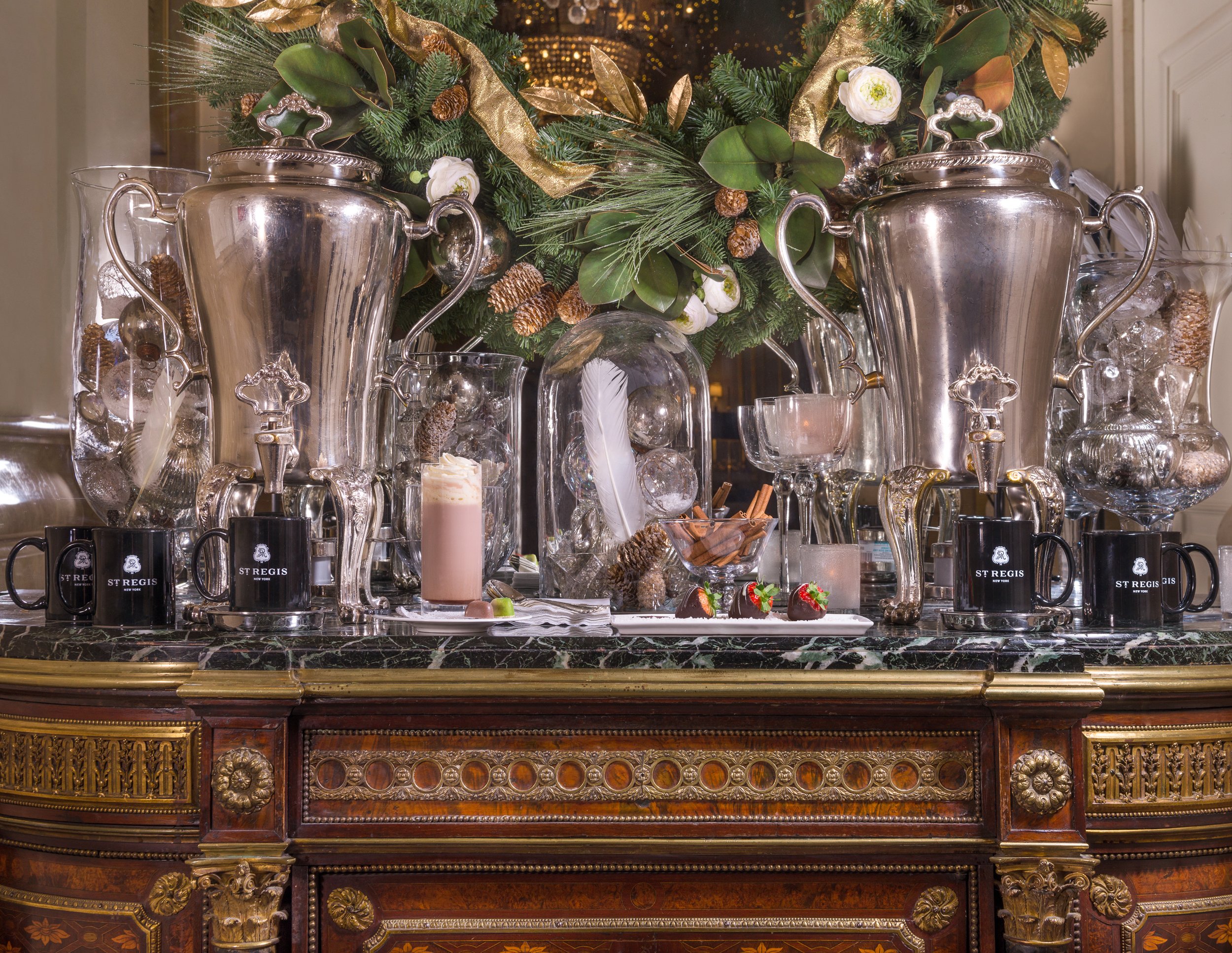 Alexander Mann hospitality interior design, St. Regis Hotel New York Christmas holiday installation, silver urns, seasonal florals