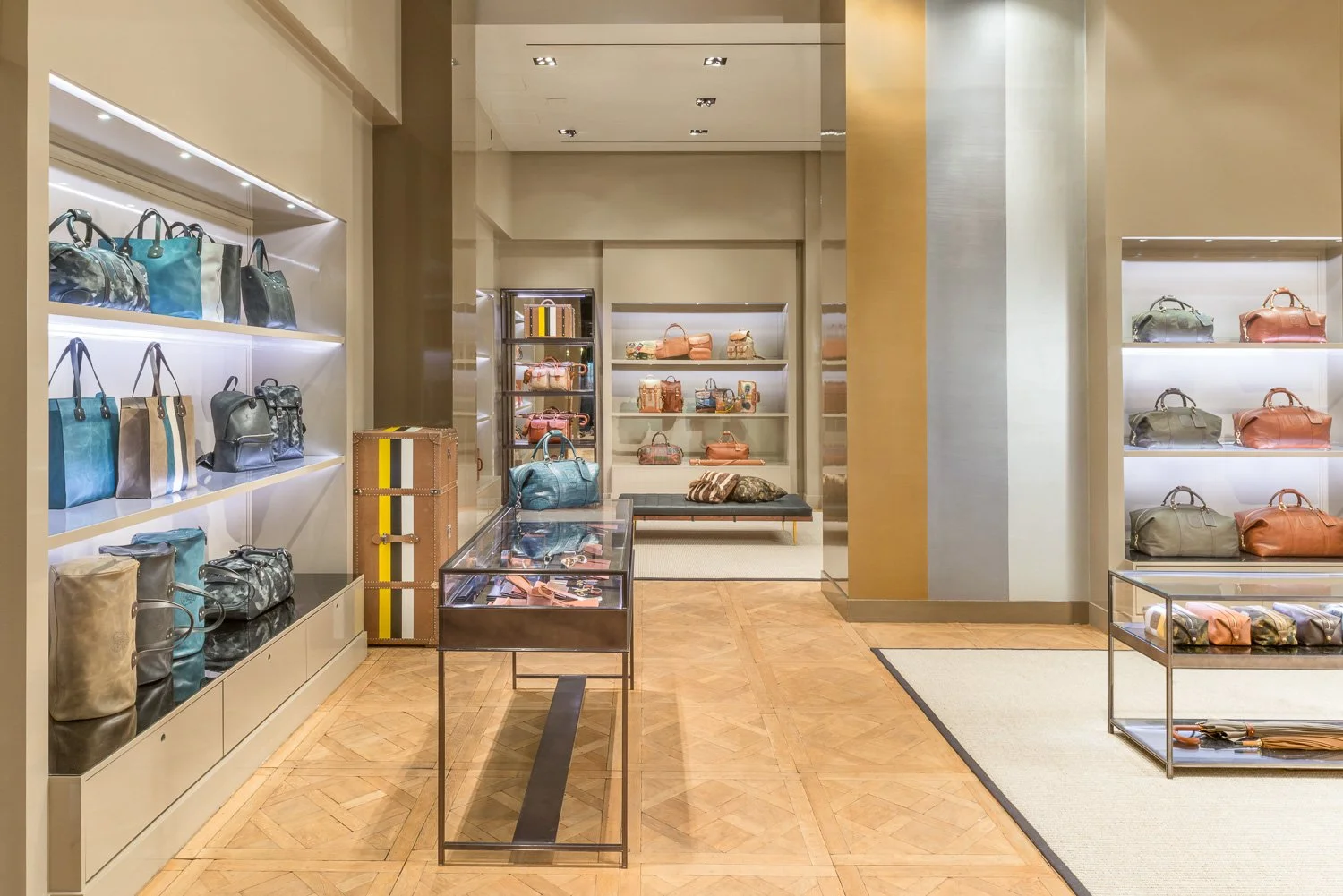 Alexander Mann retail environment design, Ghurka Madison Avenue flagship interior, luxury leather goods display, New York City