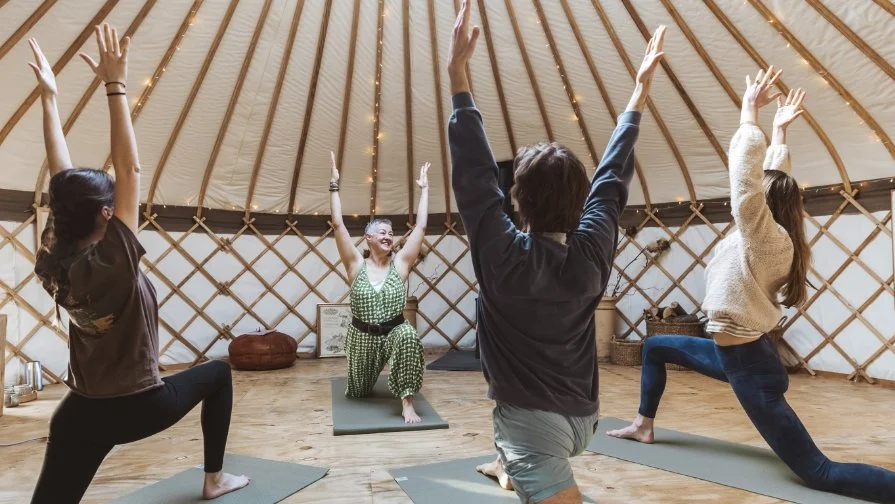 group class yoga practice in a yurt in great missenden