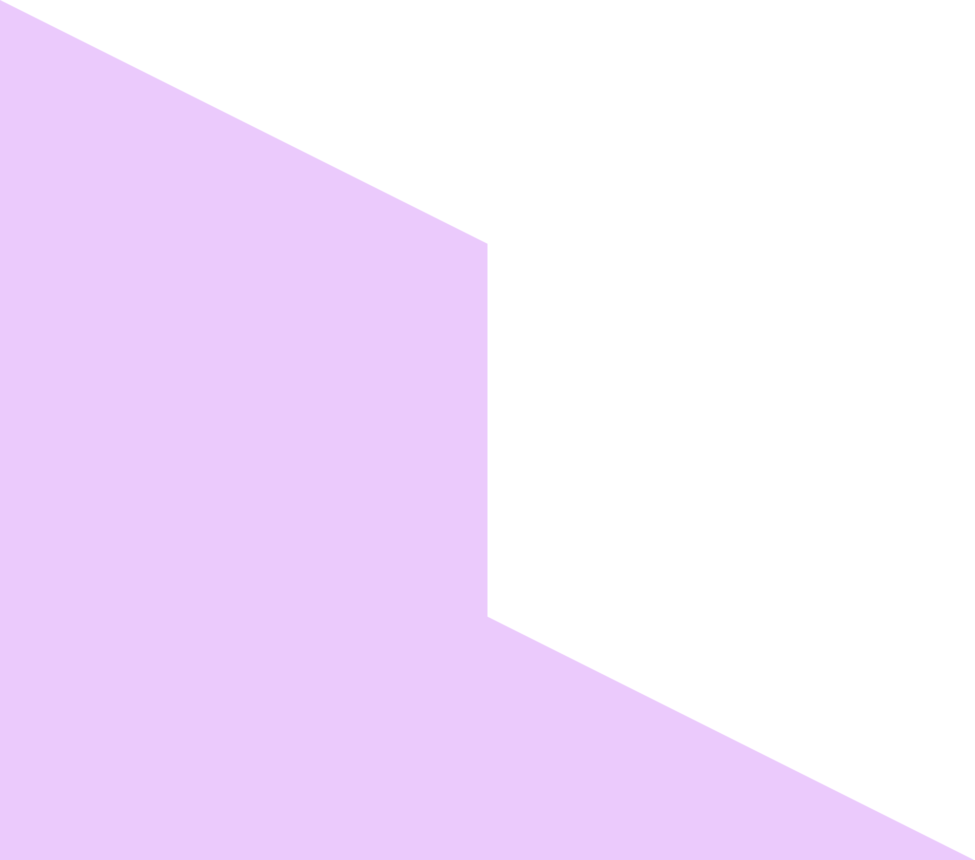 A close-up view of a hand holding a paintbrush and a palette with mixed paint, resting on a surface with scattered paintbrushes and art supplies.