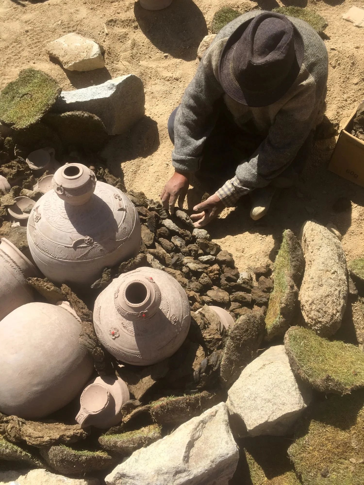 Large pots are placed at the base