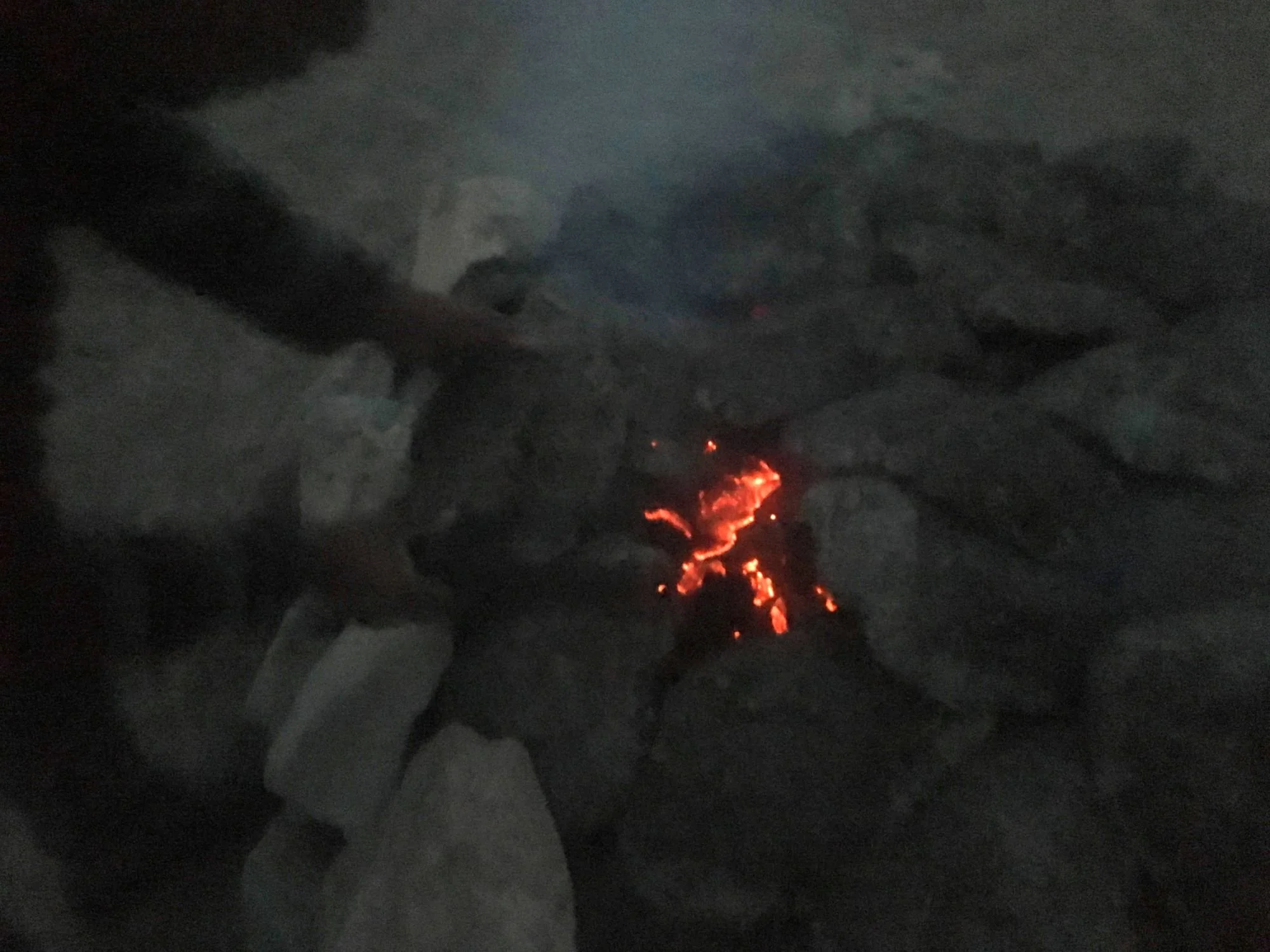 Rigzen adding fire at various spots in the kiln