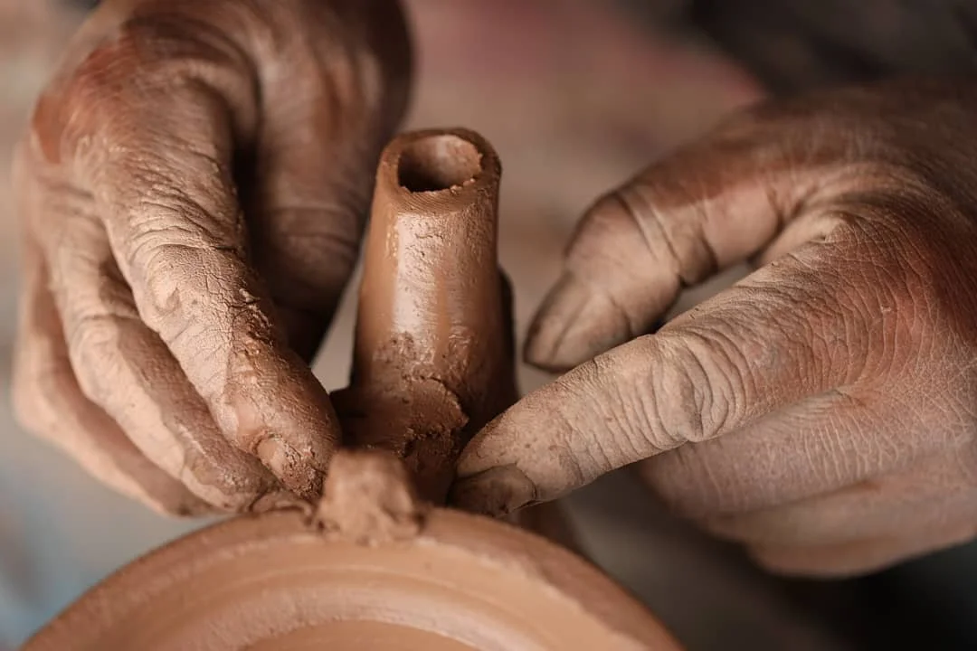 Likir Pottery making of the Teapot Spout