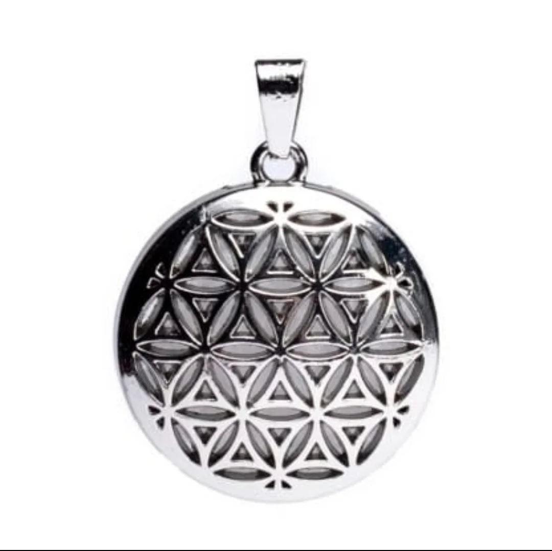 Fleur de vie pendentif et cristal de roche