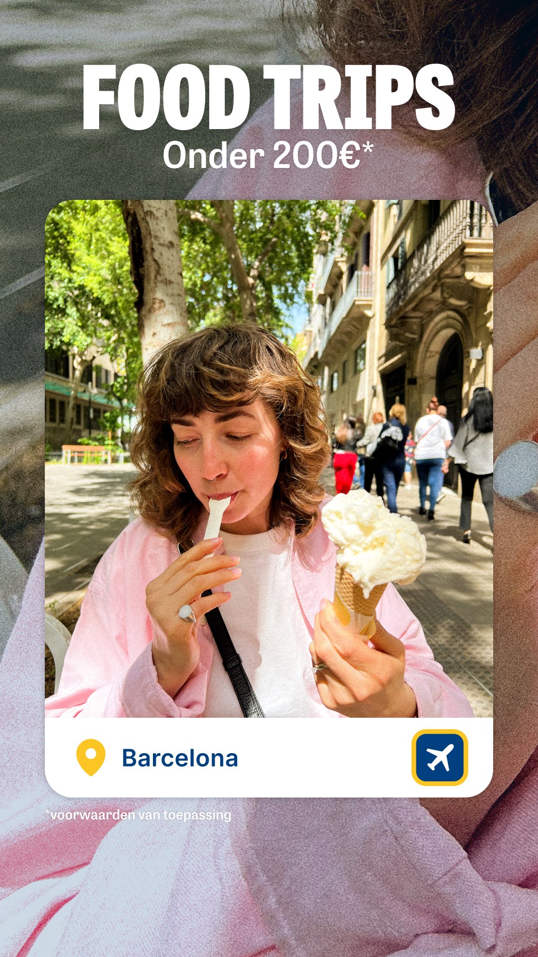 A woman enjoying a cone of vanilla ice cream on a city street in Barcelona, Spain, with people walking in the background.