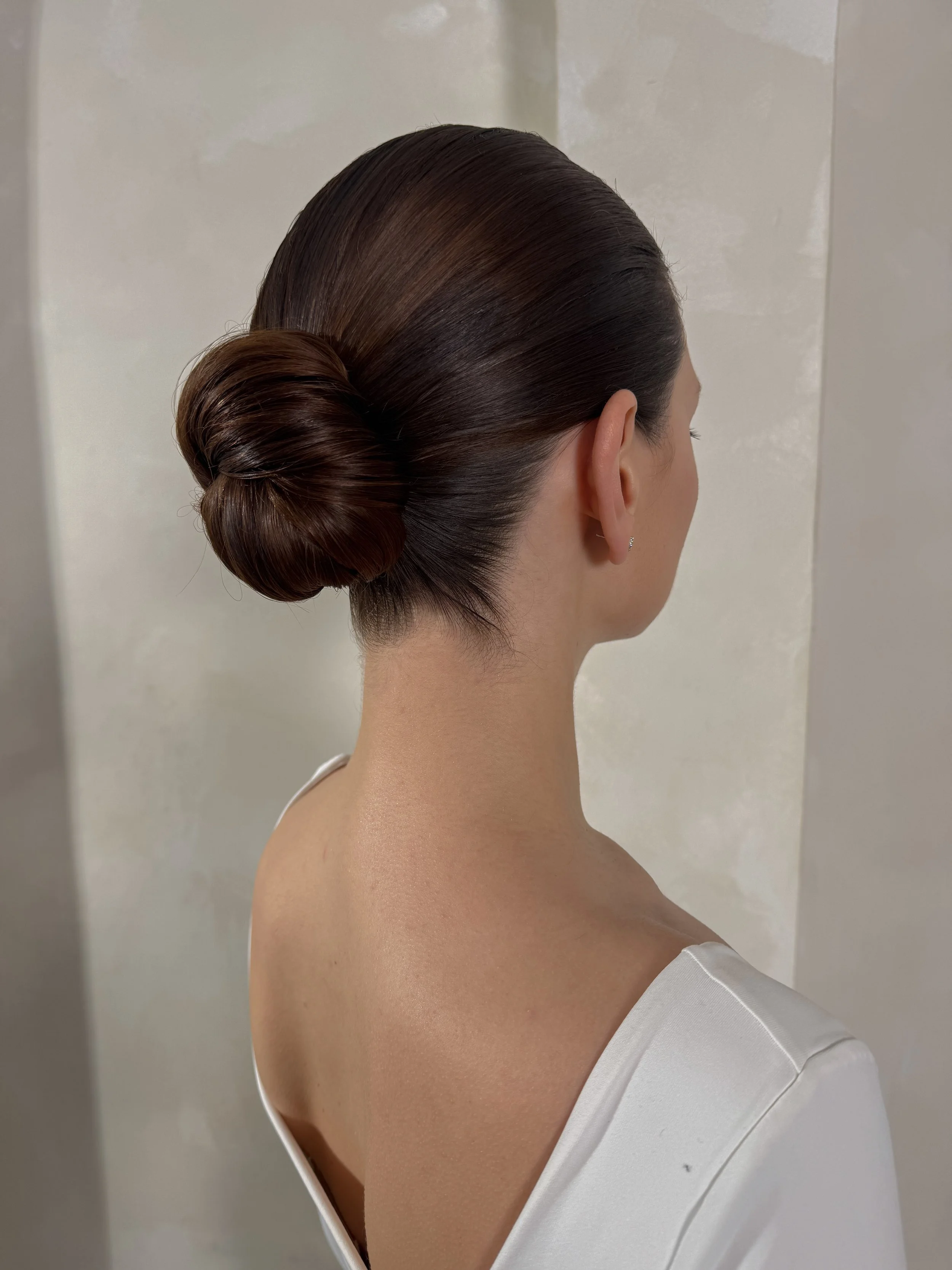 Bride getting ready for her wedding. TLC Bridal on location hair in Levittown, Pa. Taylor Cline, Bridal glam waves, timeless bridal hair, bridal bun, luxury bridal hair, bridal for brides based in Levittown, Pa