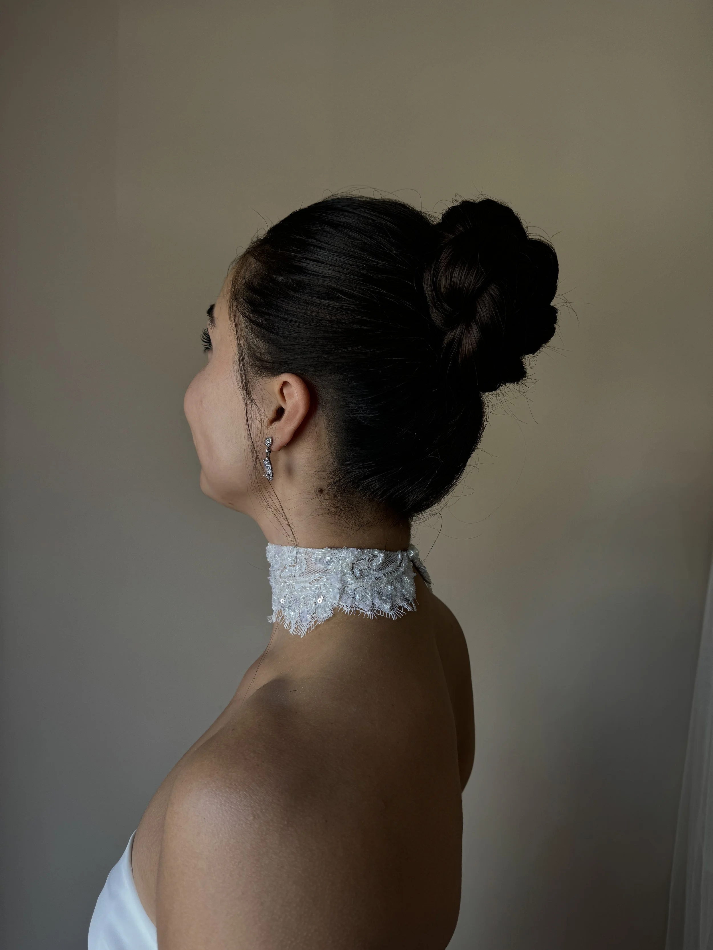 Bride getting ready for her wedding. TLC Bridal on location hair in Levittown, Pa. Taylor Cline, Bridal glam waves, timeless bridal hair, bridal bun, luxury bridal hair, bridal for brides based in Levittown, Pa