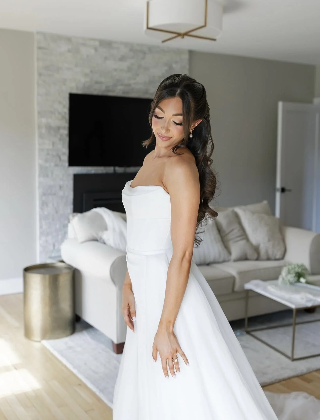 Bride getting ready for her wedding. TLC Bridal on location hair in Levittown, Pa. Taylor Cline, Bridal glam waves, timeless bridal hair, bridal bun, luxury bridal hair, bridal for brides based in Levittown, Pa