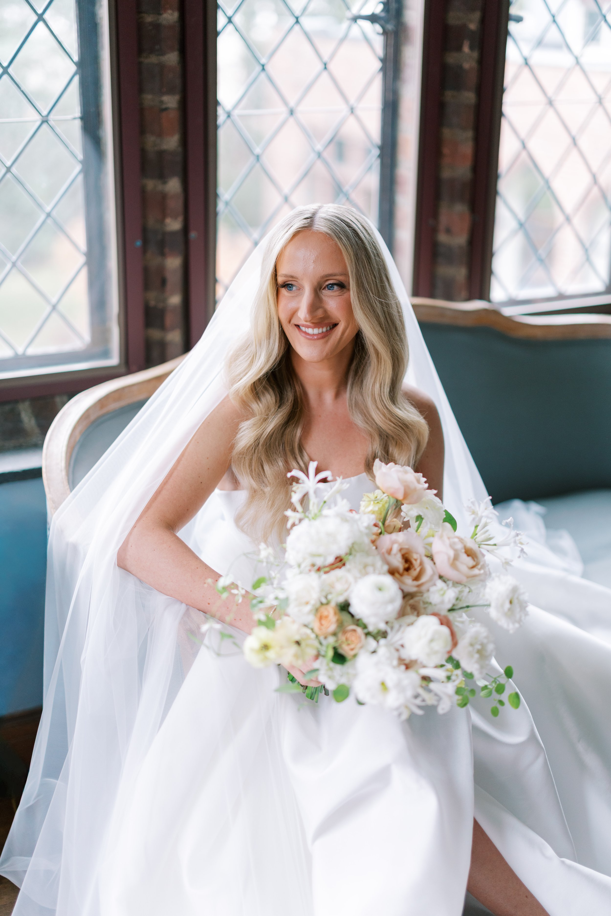 Bride getting ready for her wedding. TLC Bridal on location hair in Levittown, Pa. Taylor Cline, Bridal glam waves, timeless bridal hair, bridal bun, luxury bridal hair, bridal for brides based in Levittown, Pa