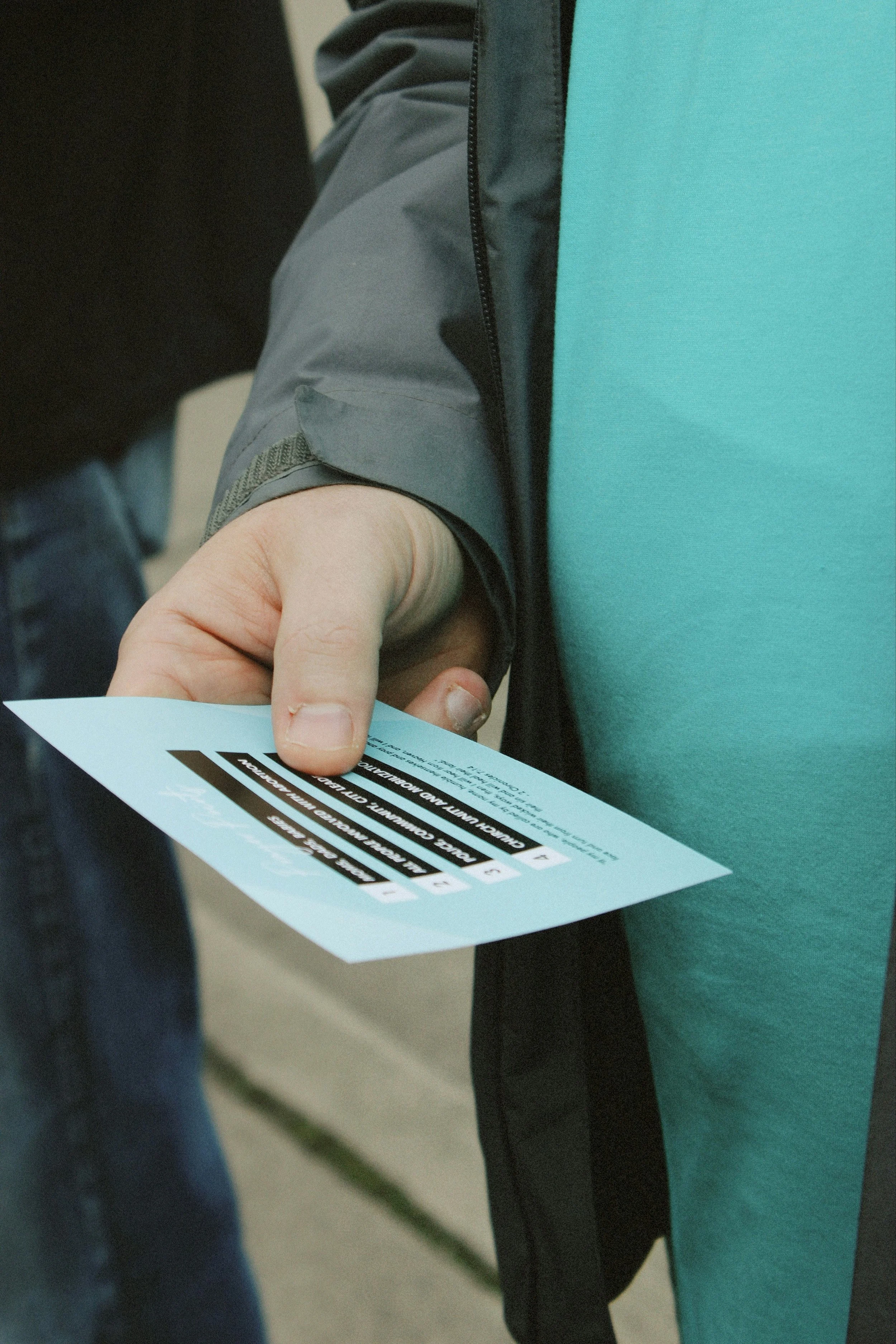 A man holding a leaflet