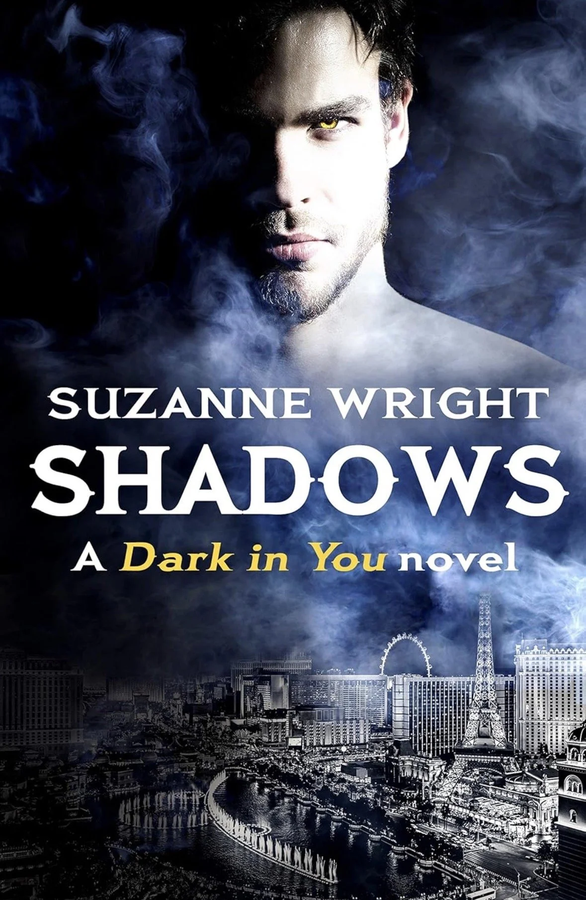 Book cover for 'Shadows' by Suzanne Wright, featuring a half-lit male face with glowing yellow eyes, smoky background, and a cityscape including the Eiffel Tower.
