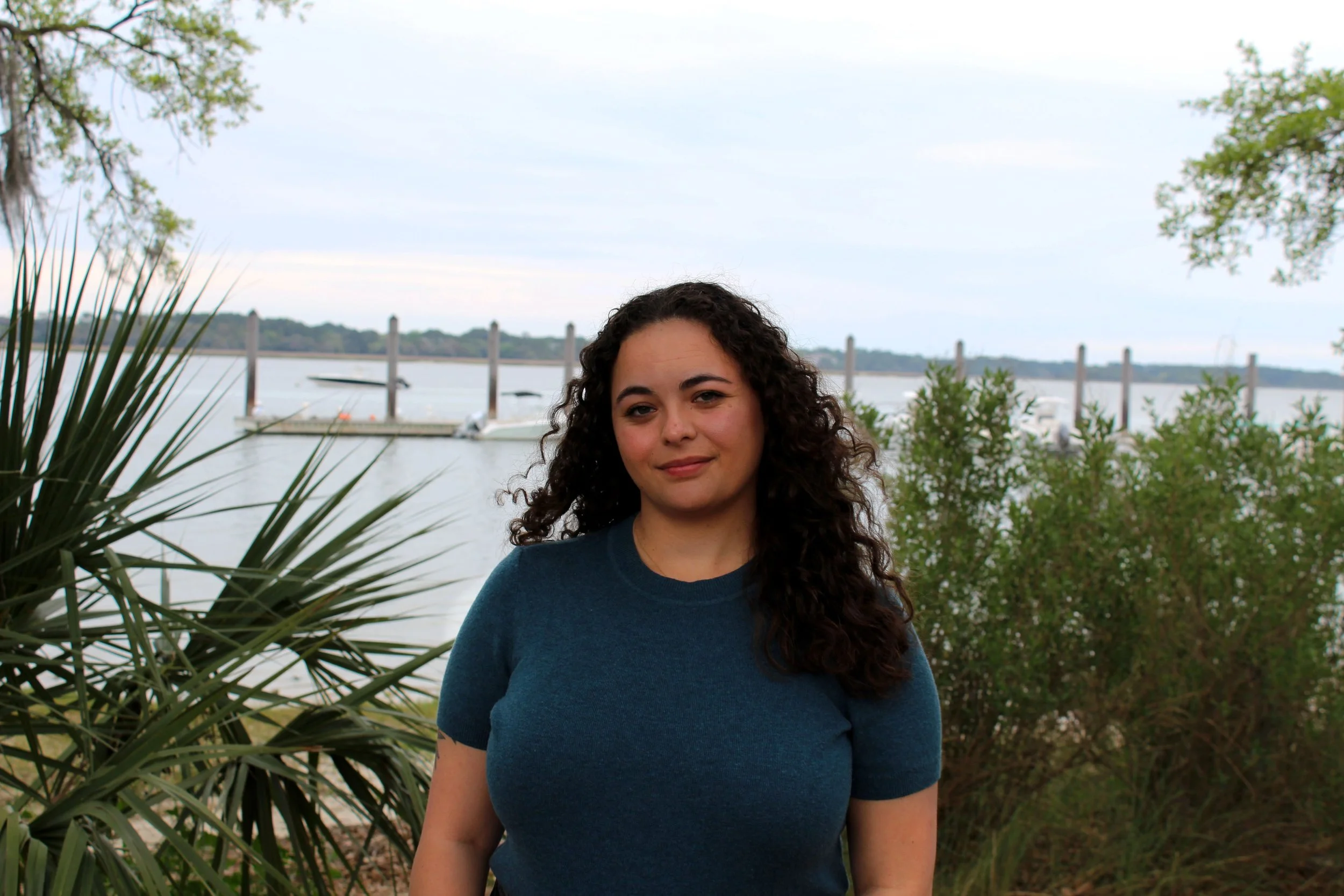 Natalie Wan, LISW-CP smiling in front of waterfront