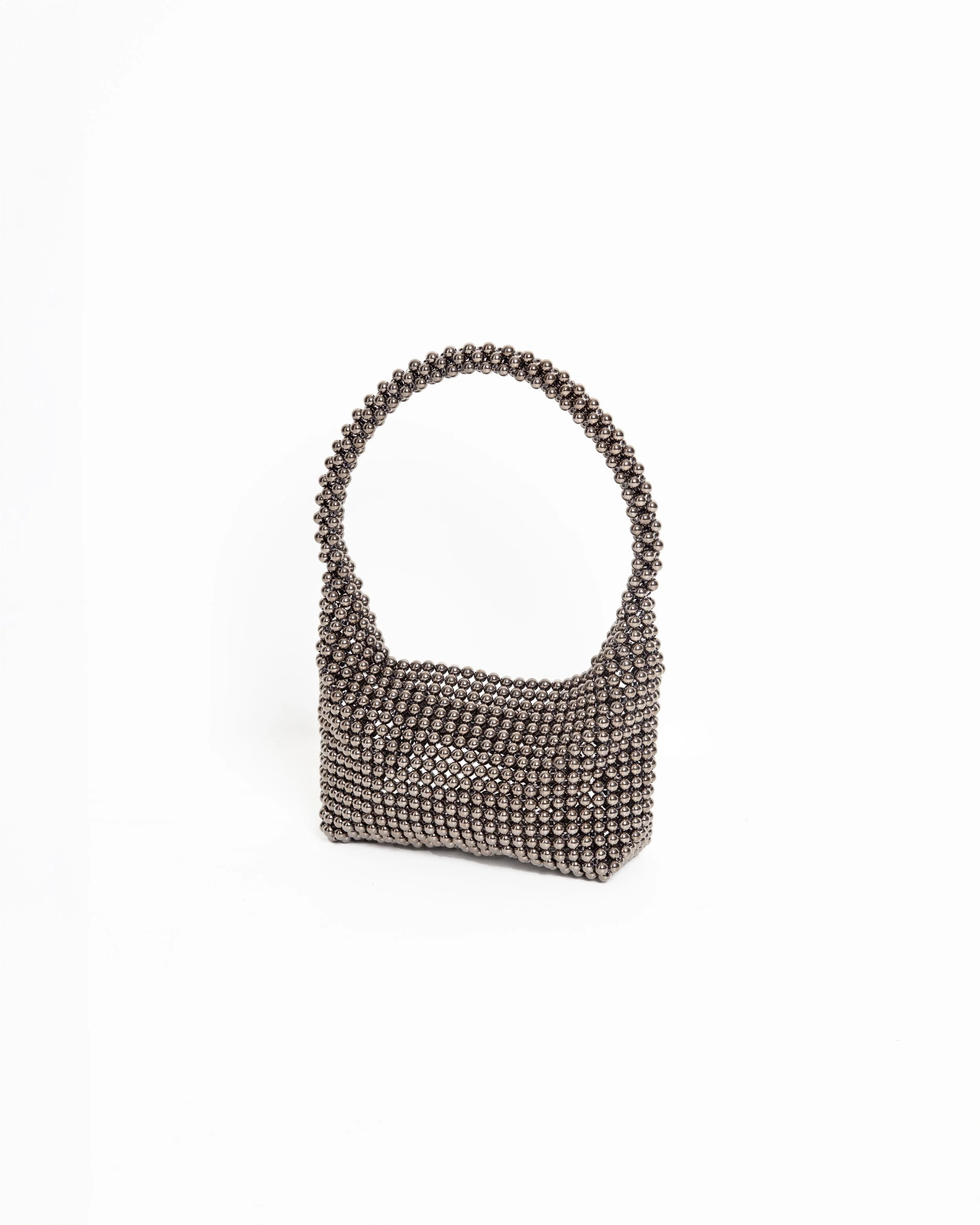 A handbag made of metallic beads with a rounded handle, placed on a white background.