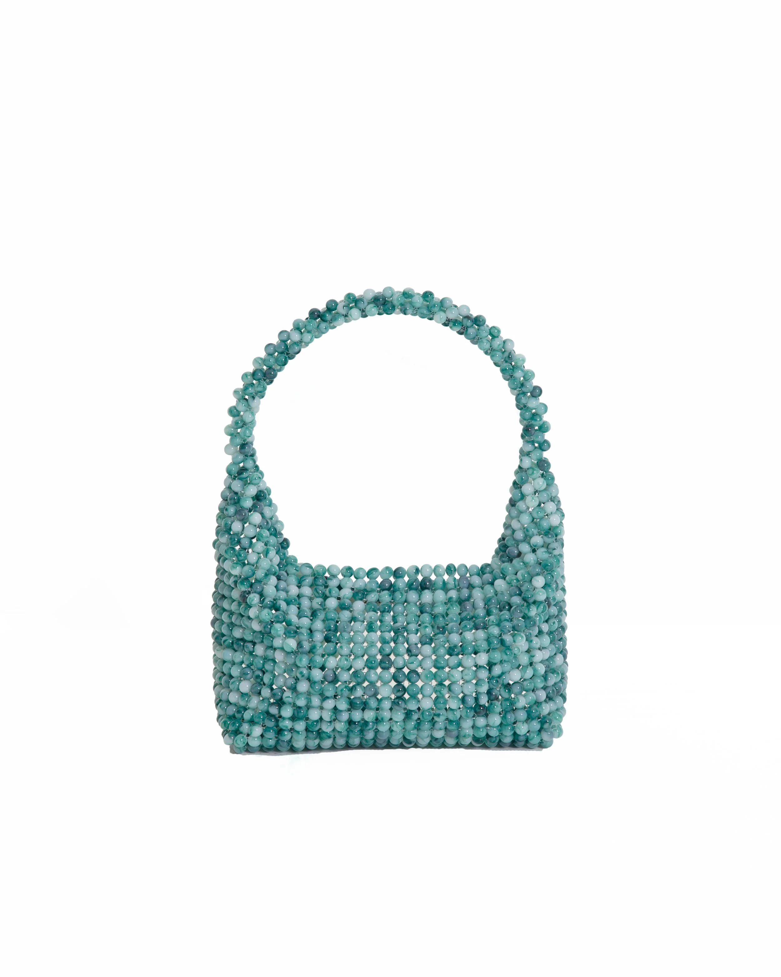 A handbag made of small blue and turquoise beads against a white background.