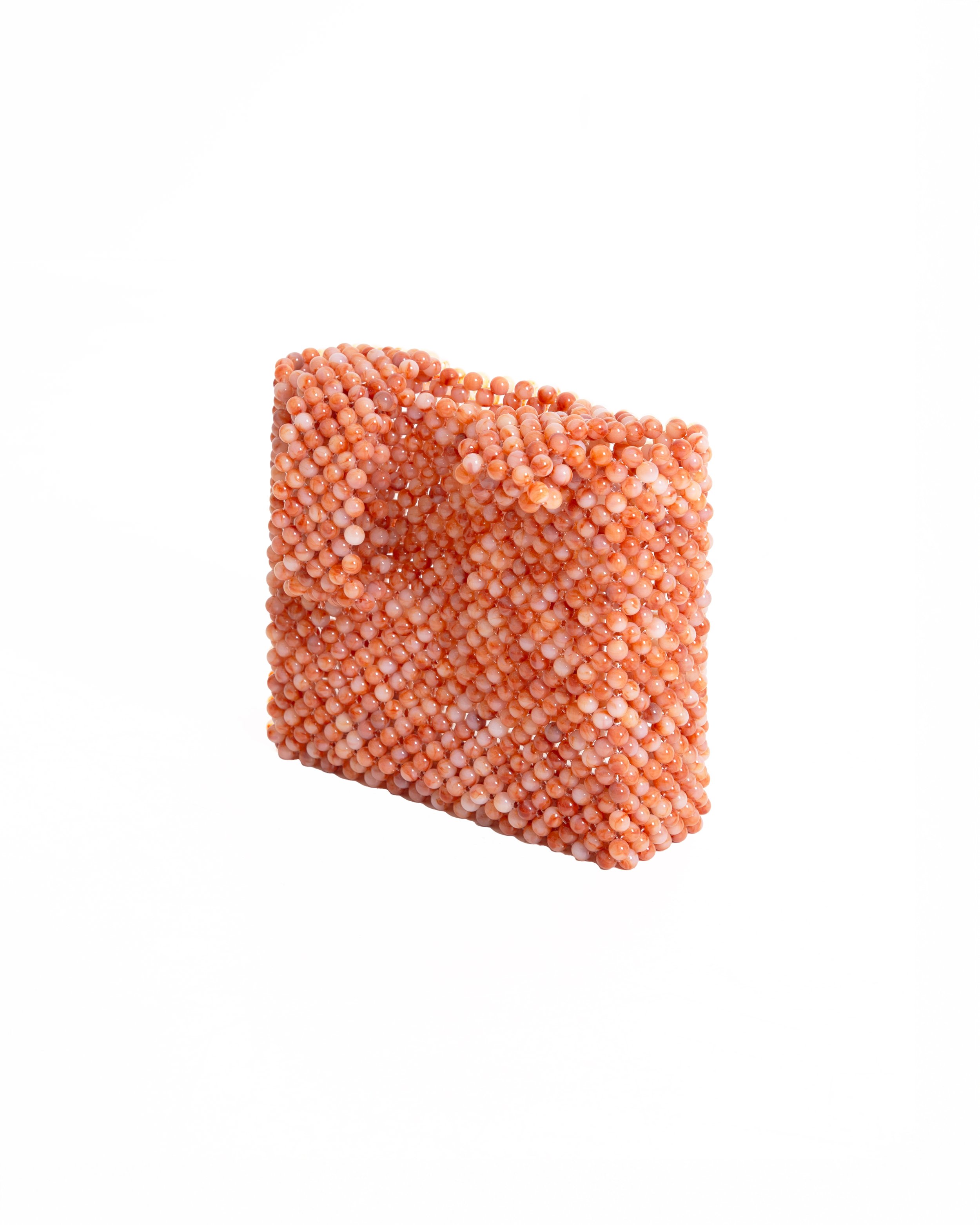A rectangular clutch bag covered in small pink beads.