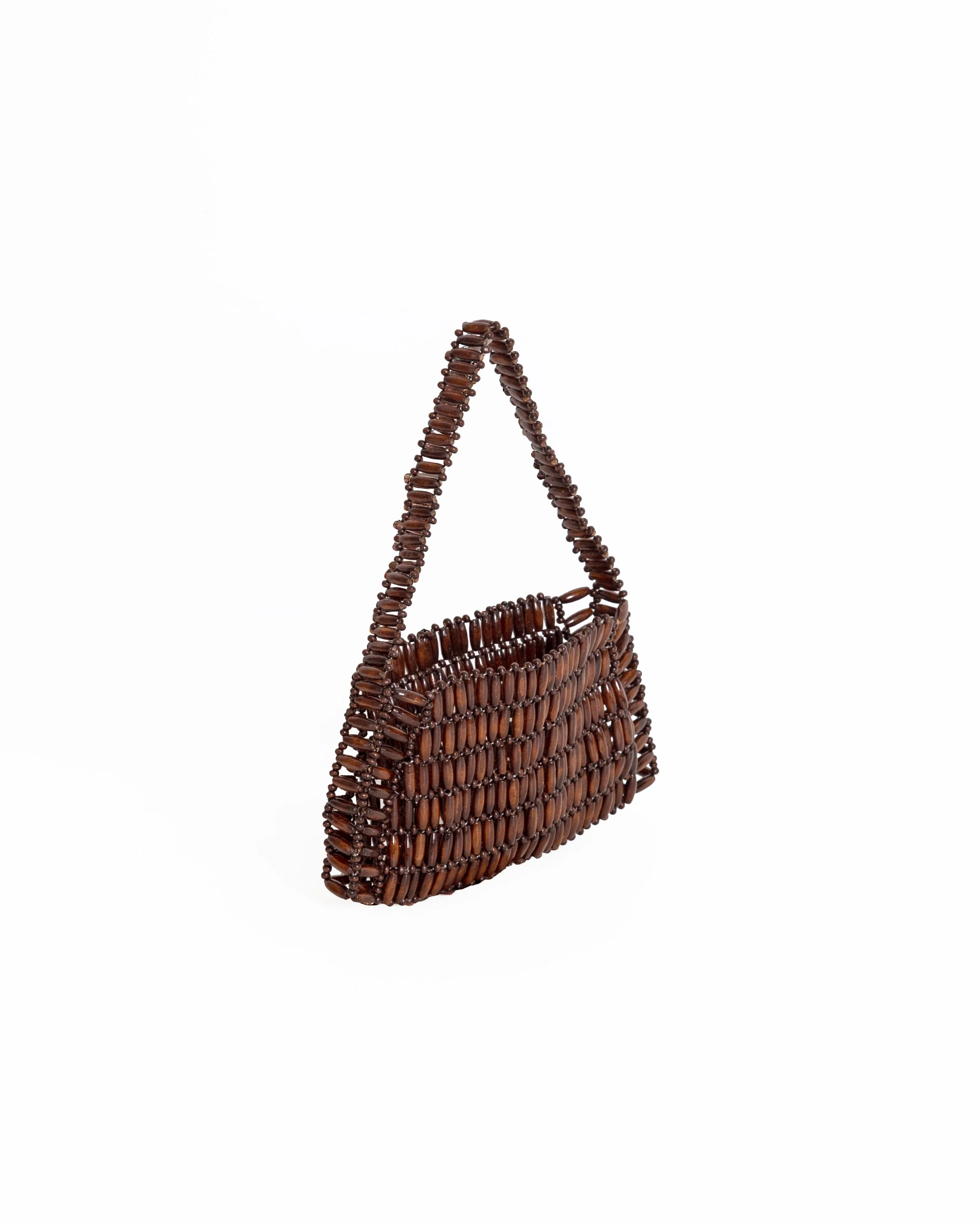 Brown handbag made with small wooden beads against a white background.