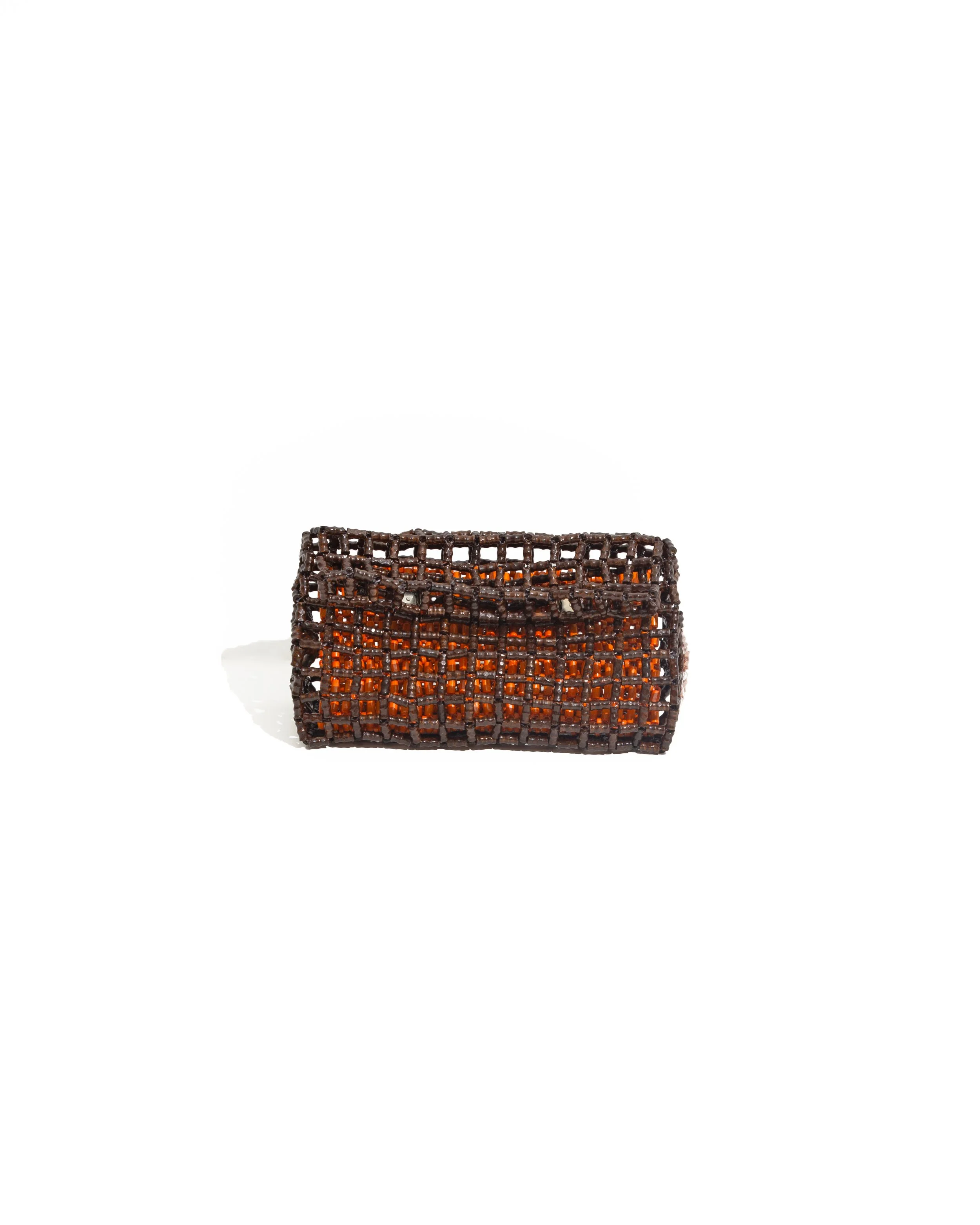 A rectangular clutch purse with a dark brown wooden beads exterior and bright orange interior beads.