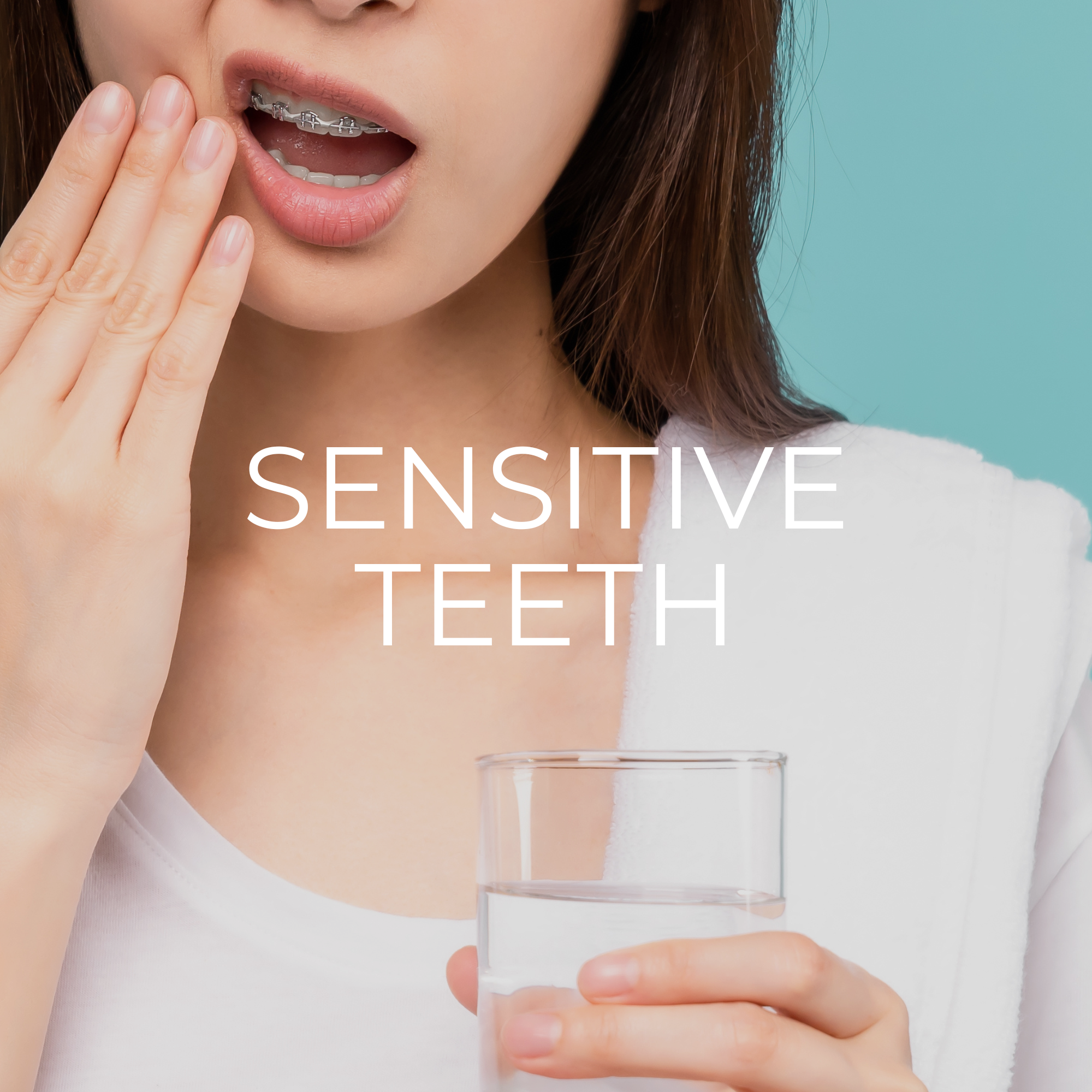 A woman with brackets in her teeth touching her cheek with her hand while holding a glass of water, with the text "Sensitive Teeth" overlaid on the image.