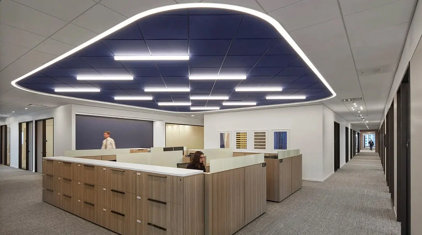 Framed artwork in a corporate office communal workspace illustrating DeGroot Fine Art fine art consulting and collection management services for legal and corporate clients on the homepage.