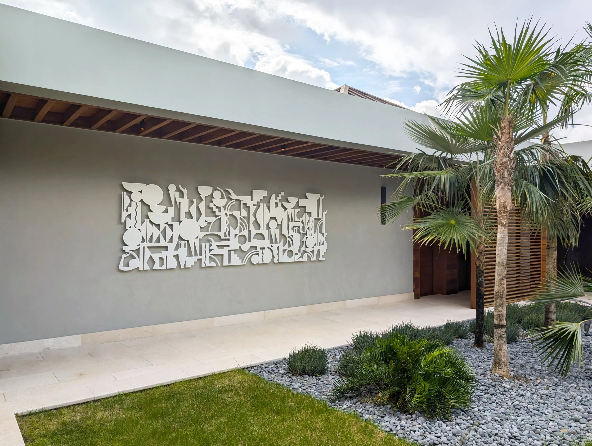 Custom outdoor art installation at a private residence in the British Virgin Islands illustrating DeGroot Fine Art international fine art consulting and private collection services featured in Selected Work.