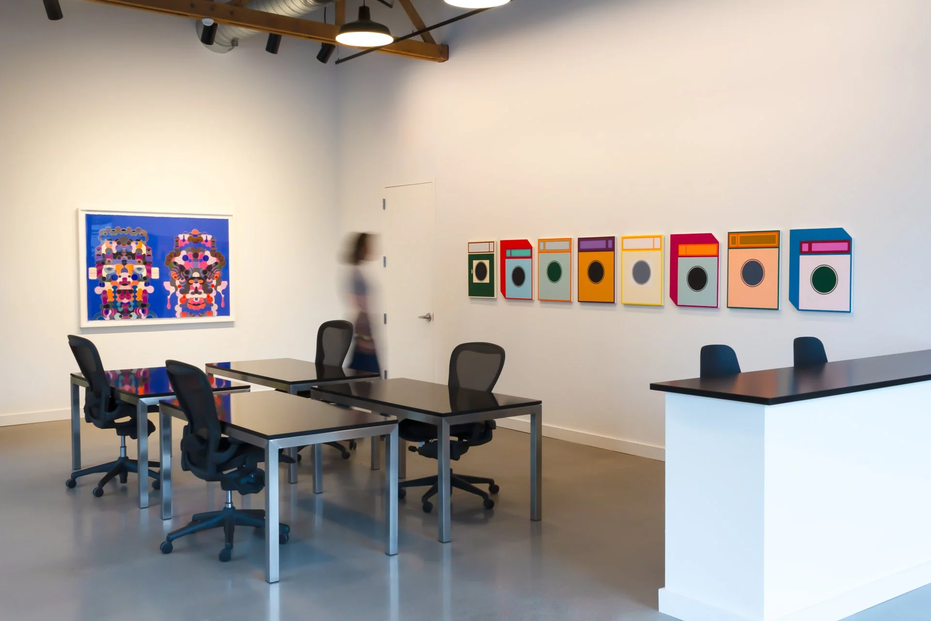 An exhibition installed at DeGroot Fine Art offices in Chicago illustrating the firm’s full-service fine art consulting expertise and curatorial programming as featured on the homepage.
