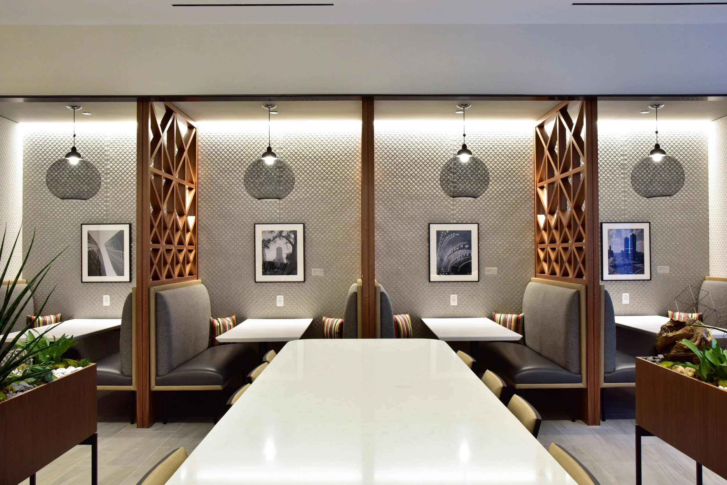 A financial corporate headquarters lobby with framed artworks — DeGroot Fine Art provides fine art consulting and collection management for financial sector clients.