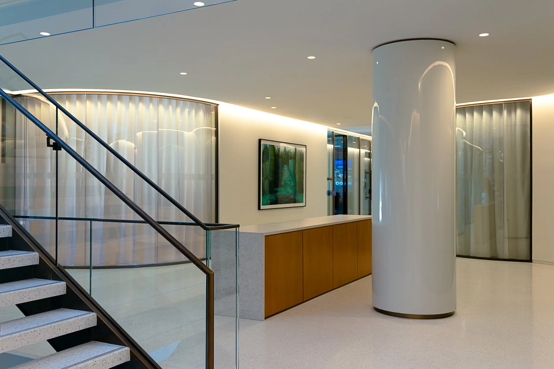 A high-end hospital corridor with framed artwork — DeGroot Fine Art provides fine art consulting and collection management for medical sector clients.