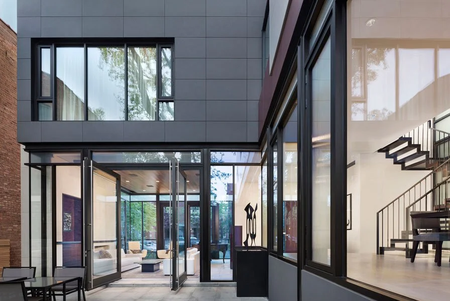 Modern private residence with outdoor sculpture illustrating DeGroot Fine Art fine art consulting and private collection management services for residential clients featured in Selected Work.